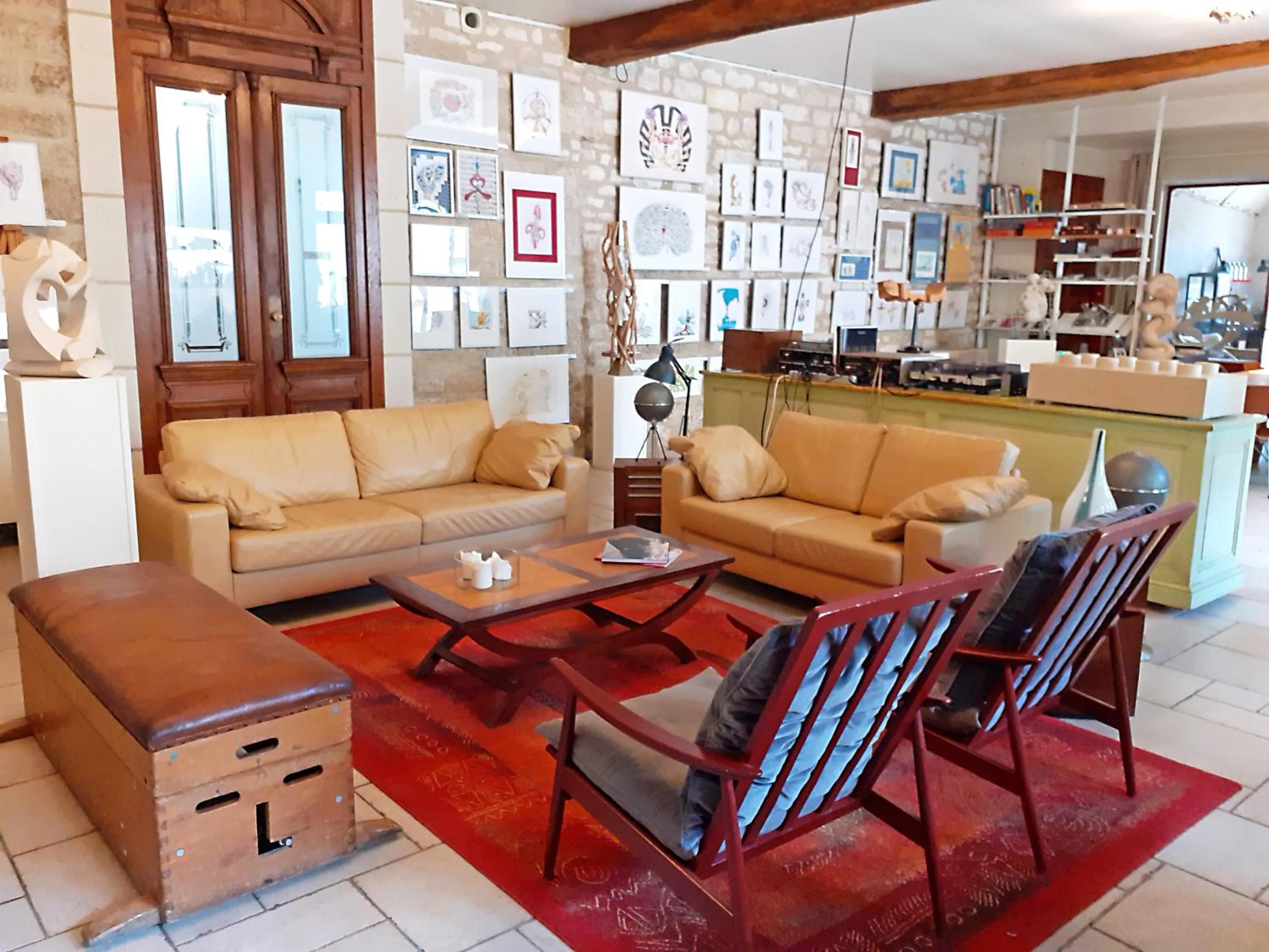 Communal lounge/ TV room in La Ferme de la Fosse Dionne