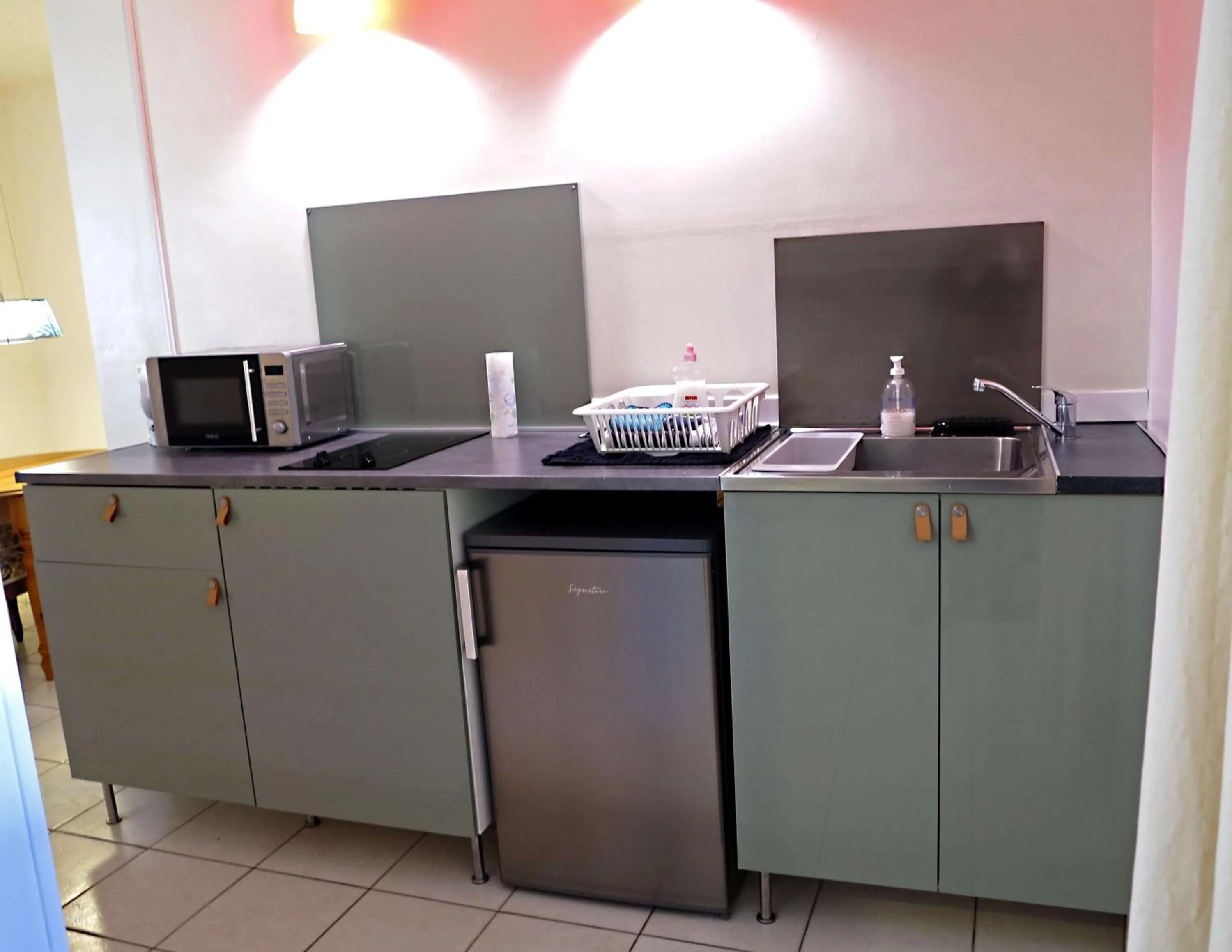 Kitchen or kitchenette in La Ferme de la Fosse Dionne