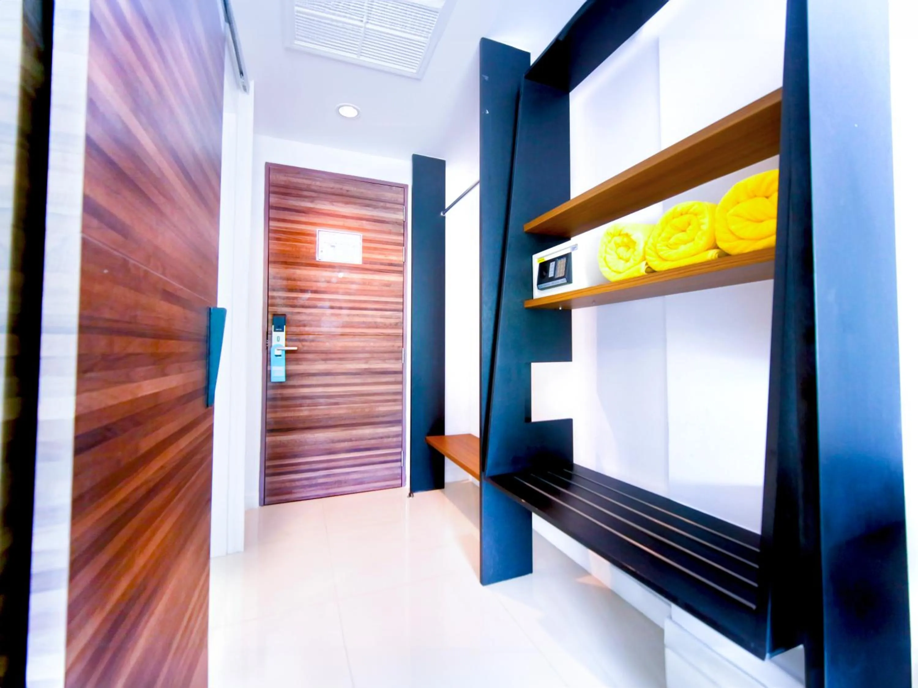 Communal lounge/ TV room, Bed in Phoenix Grand Patong