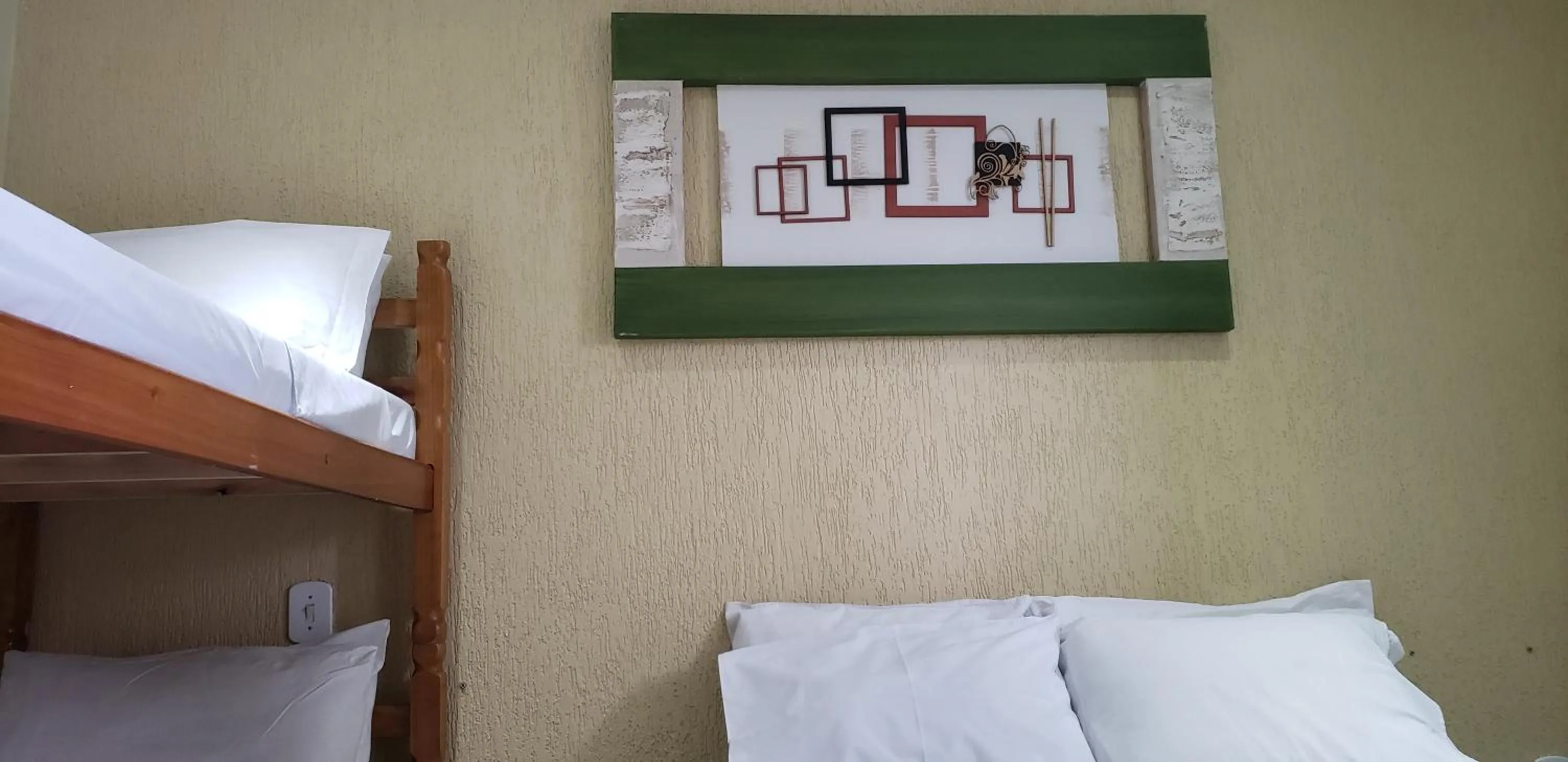 Bed in Pousada Caminho do Pontal