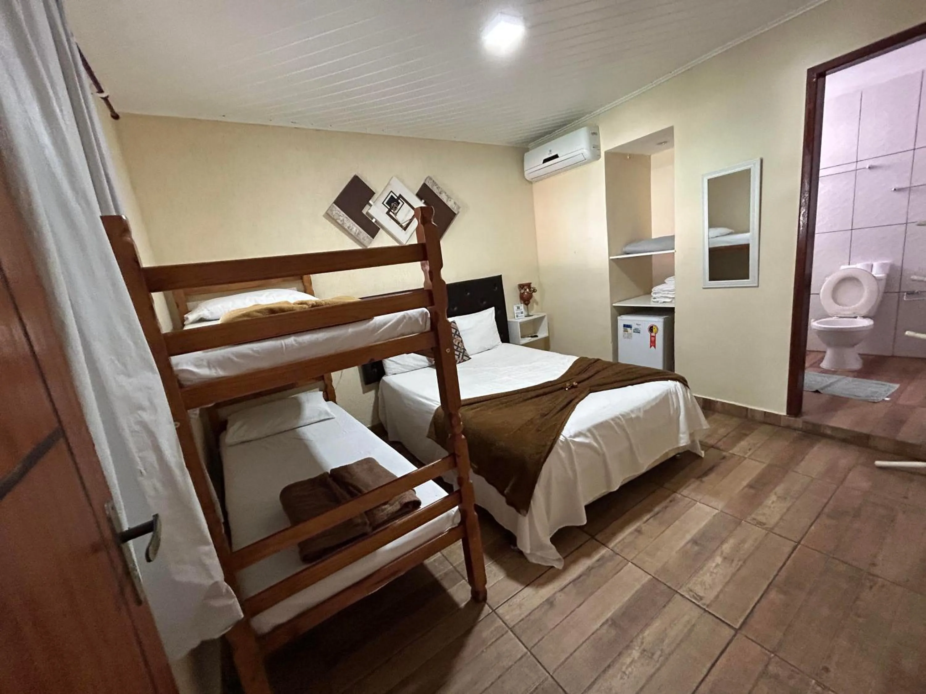 Bed in Pousada Caminho do Pontal