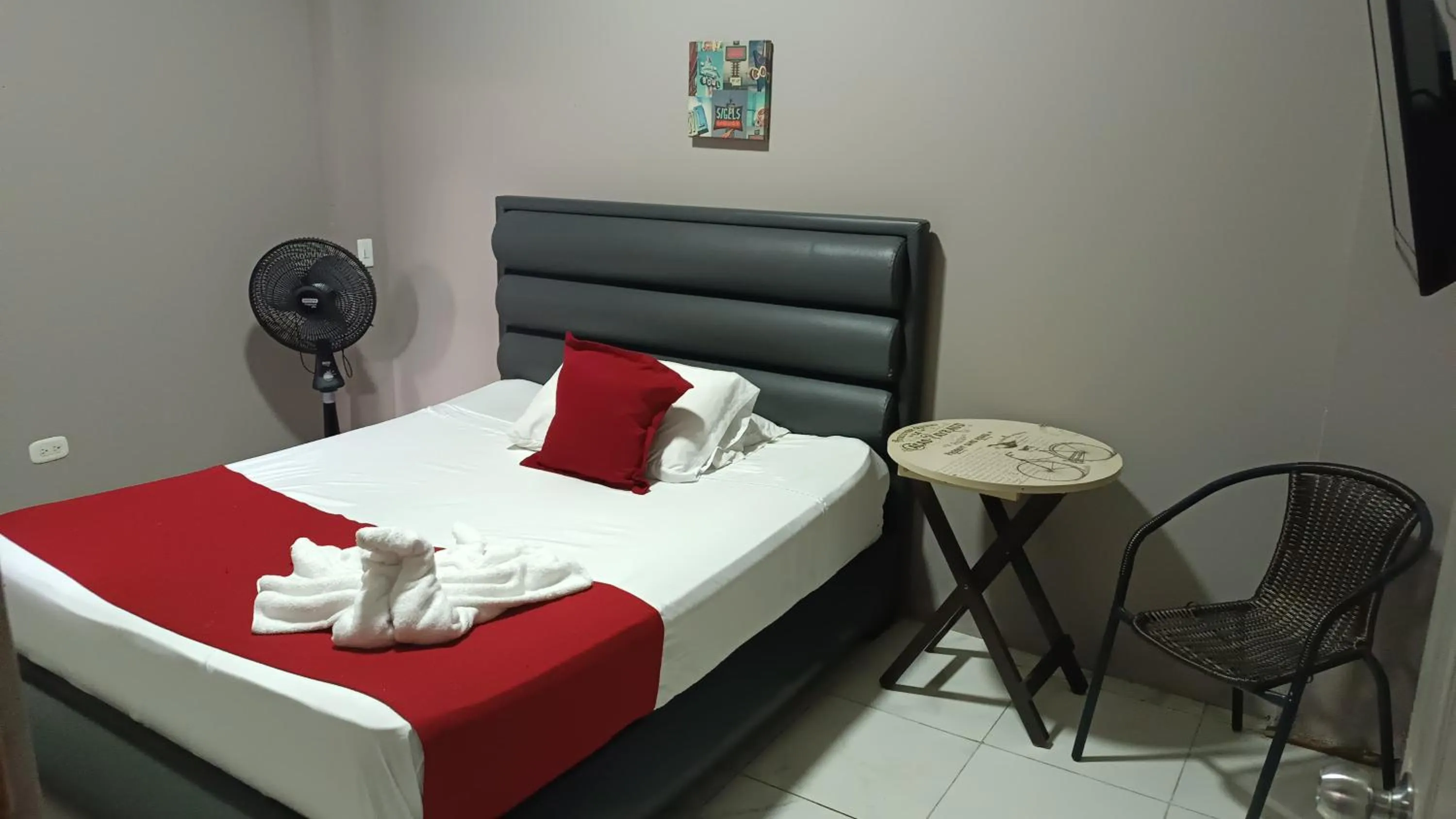 Bed in Hotel Simón Plaza