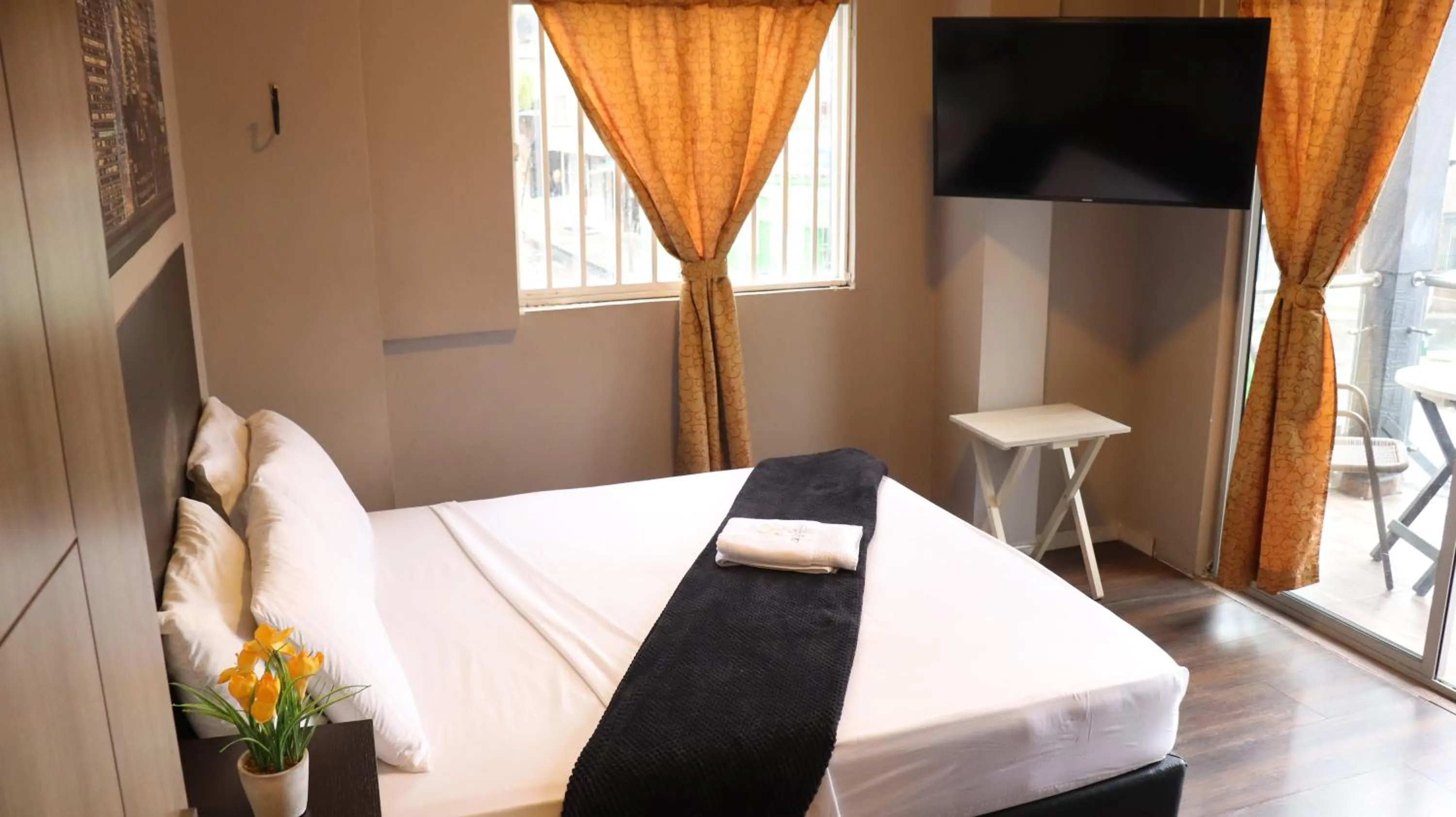 Bed in Hotel Simón Plaza