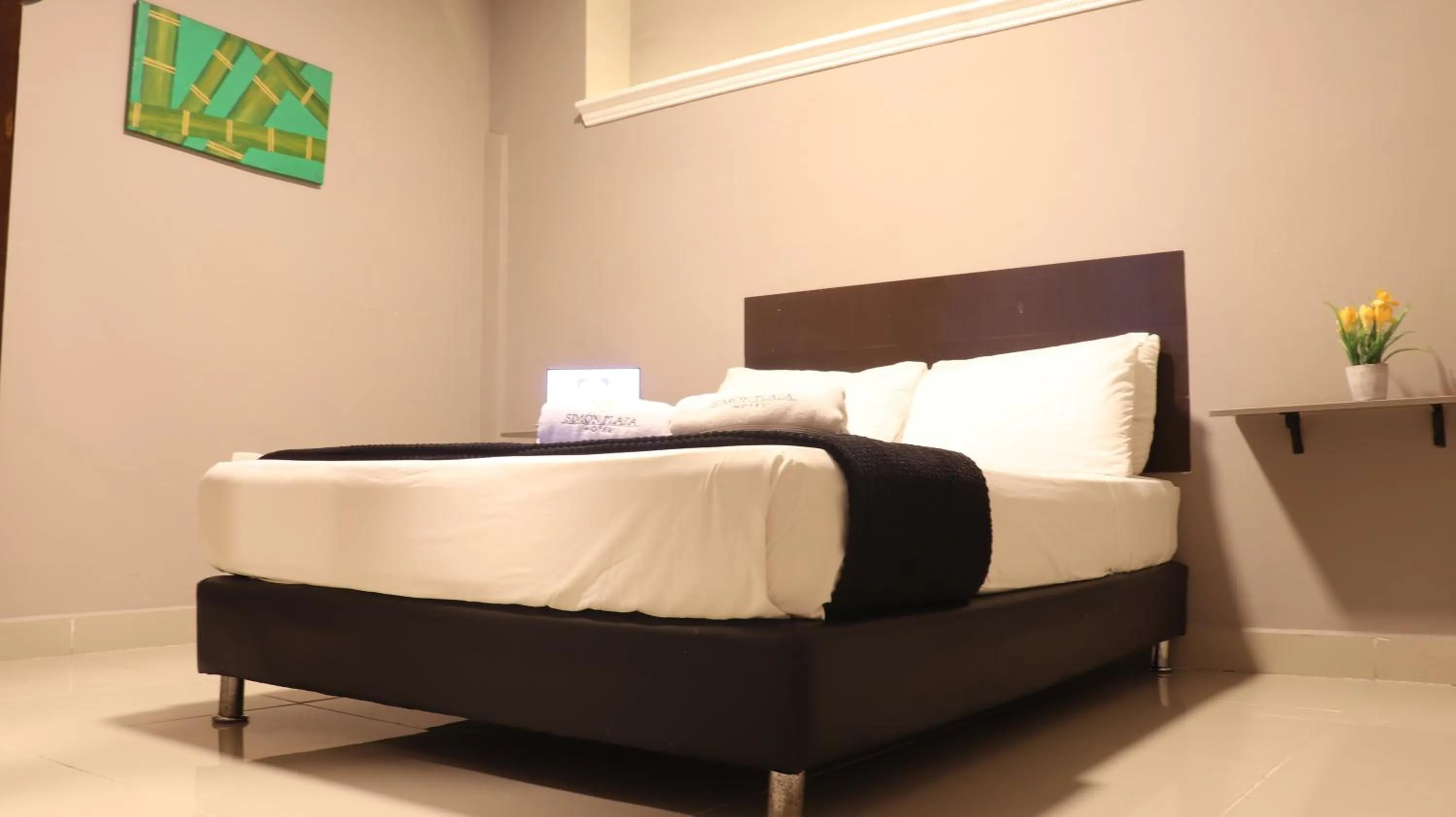 Bed in Hotel Simón Plaza