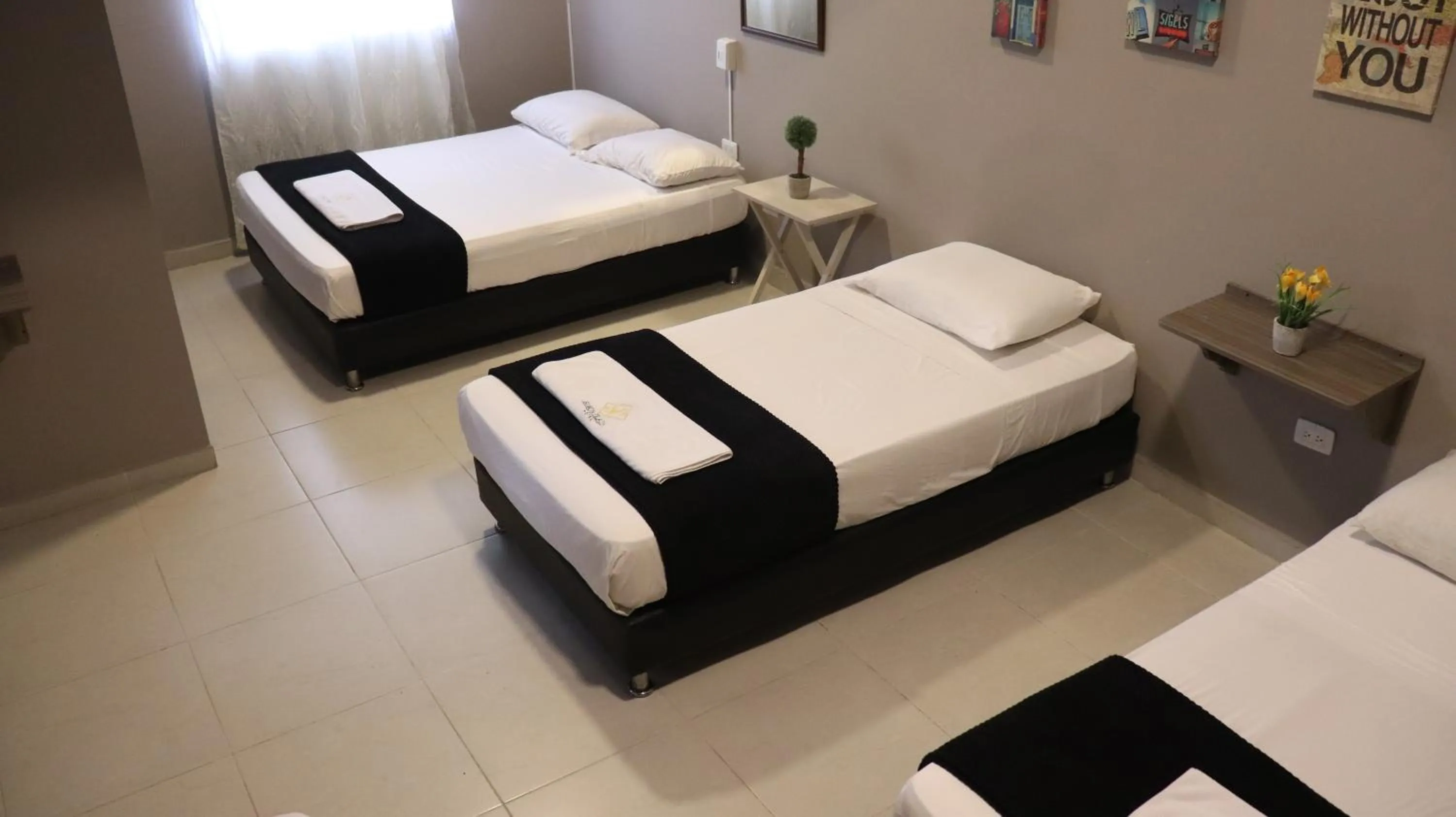 Bed in Hotel Simón Plaza