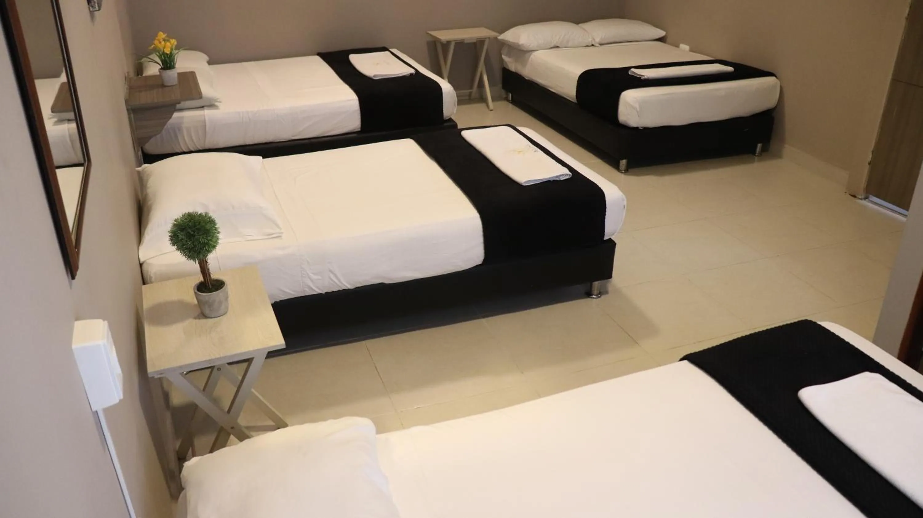 Bed in Hotel Simón Plaza