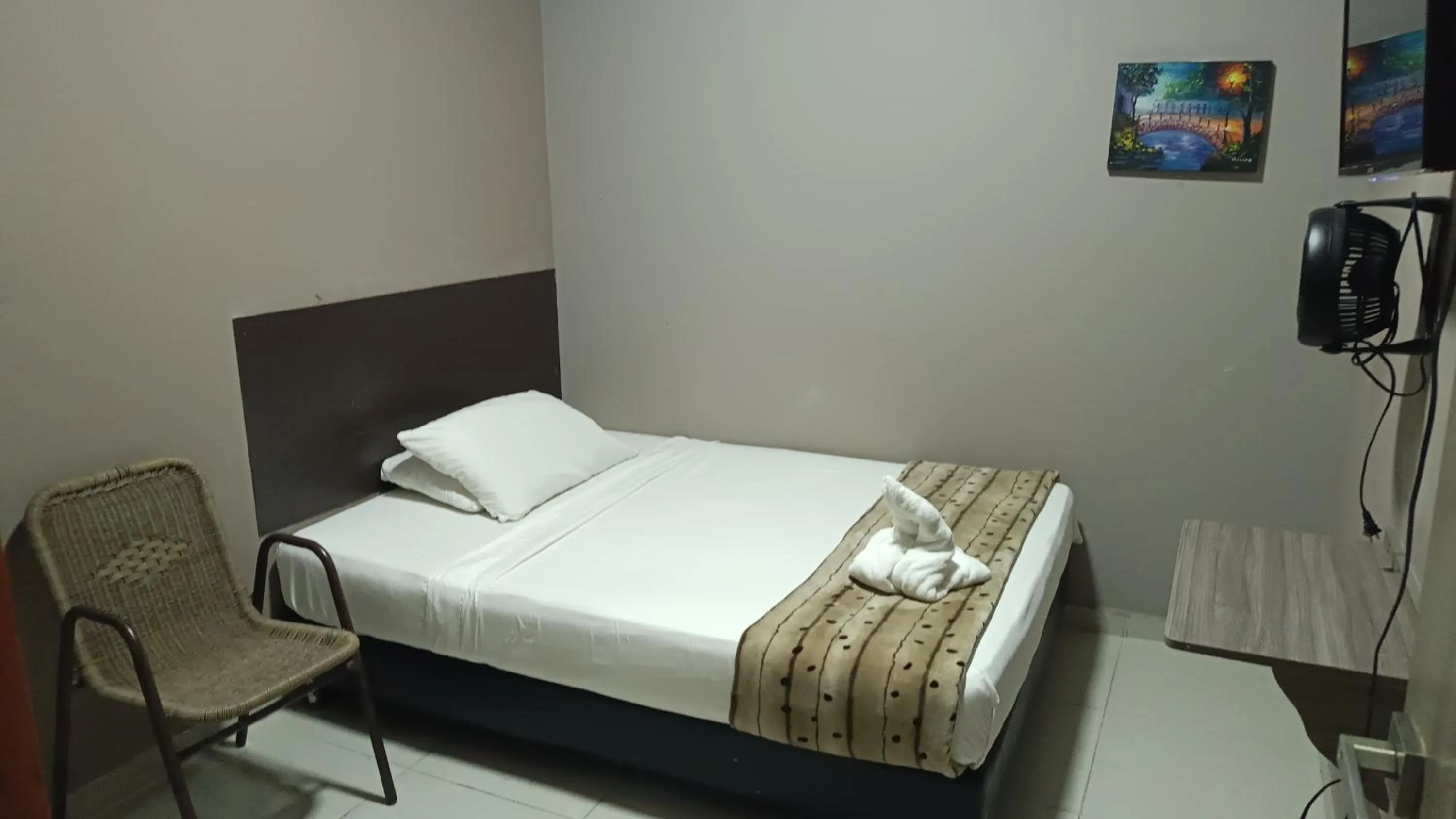 Bed in Hotel Simón Plaza