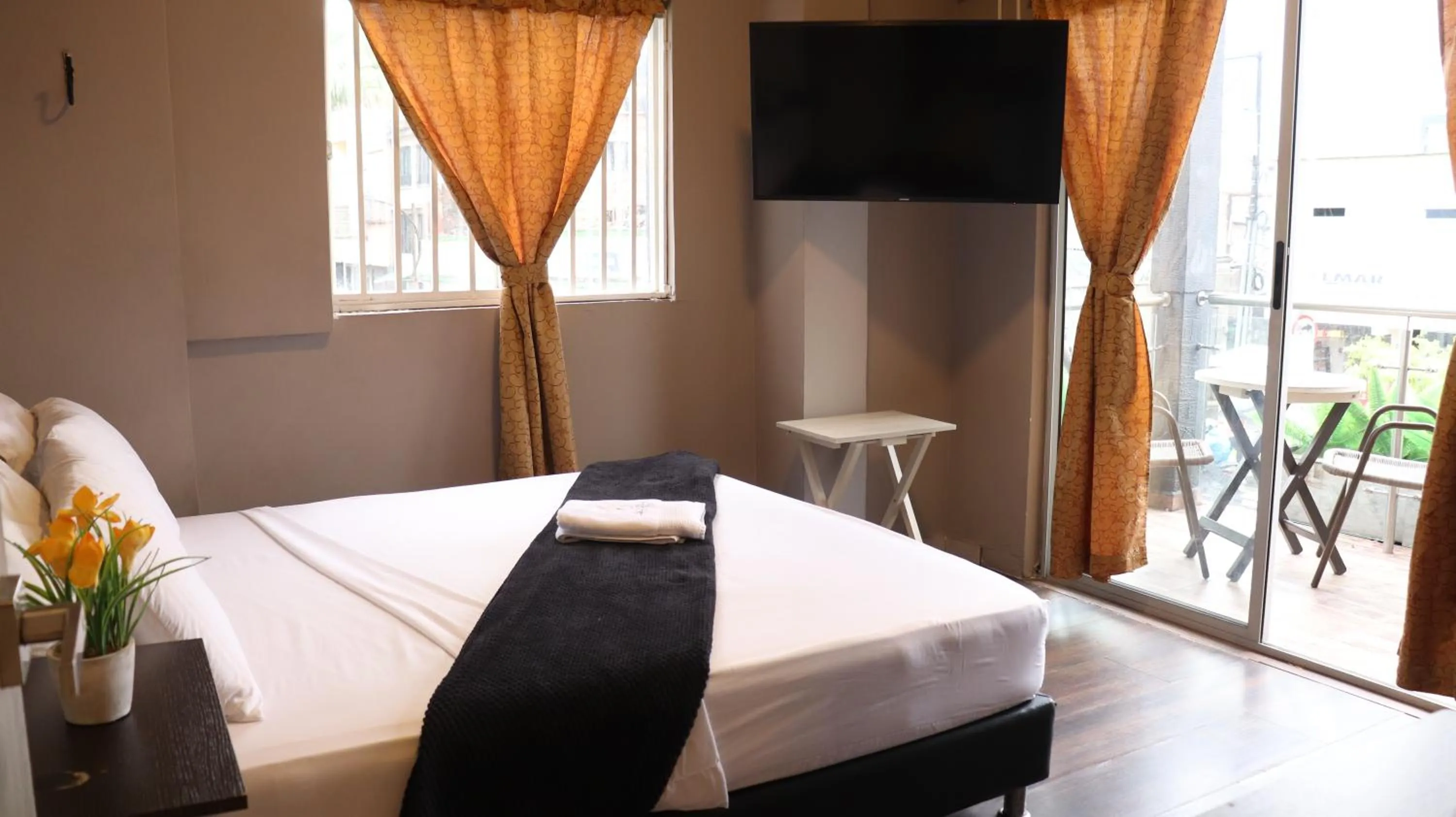 Bed in Hotel Simón Plaza