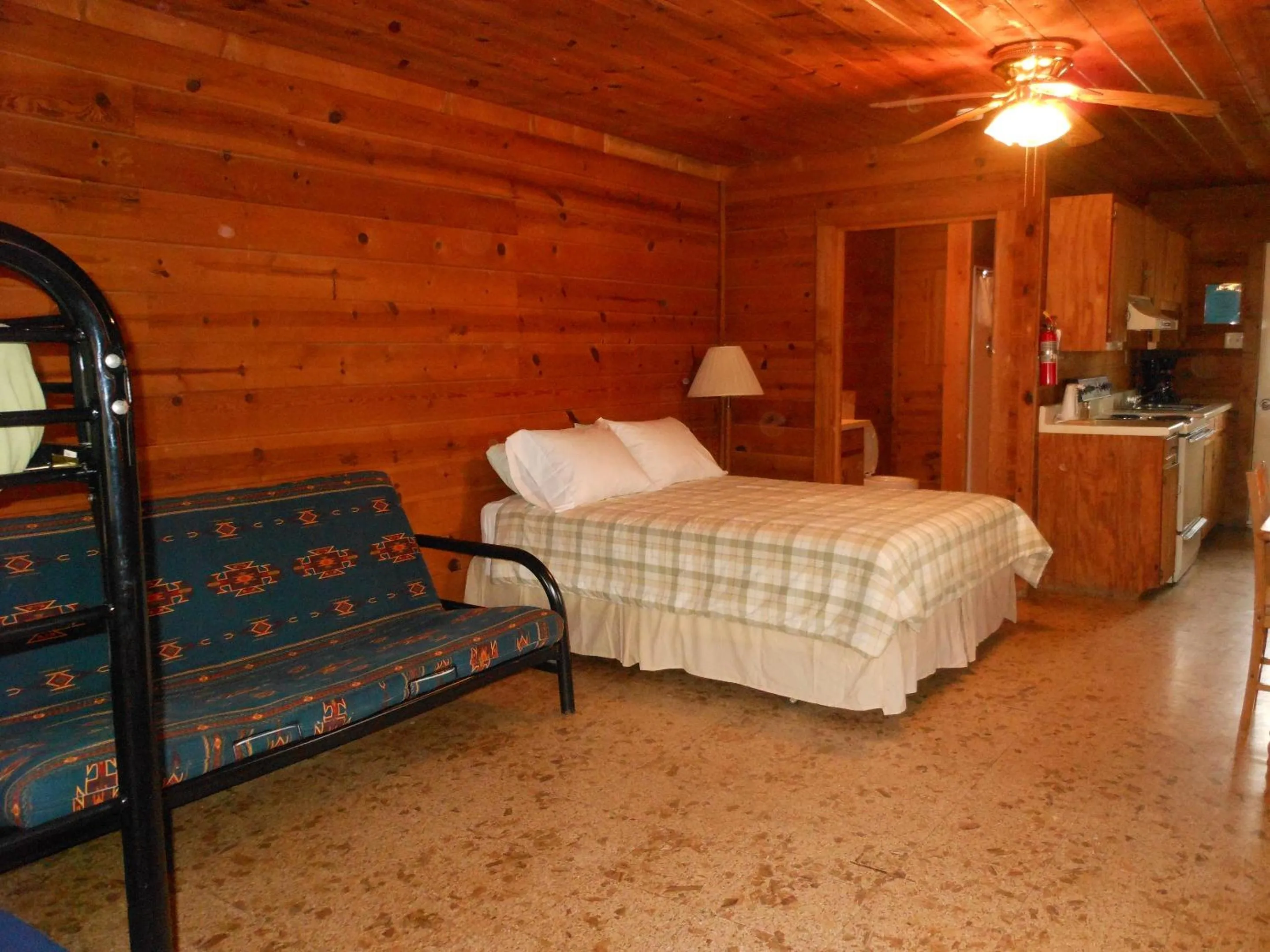 Bedroom, Bed in Bay Landing Camping Resort Deluxe Cabin 29