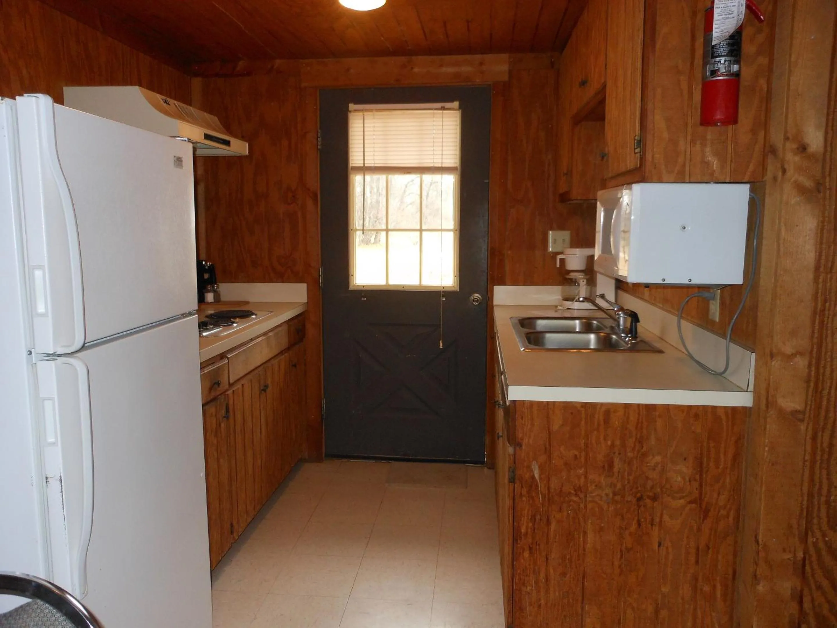 Kitchen or kitchenette in Bay Landing Camping Resort Deluxe Cabin 29