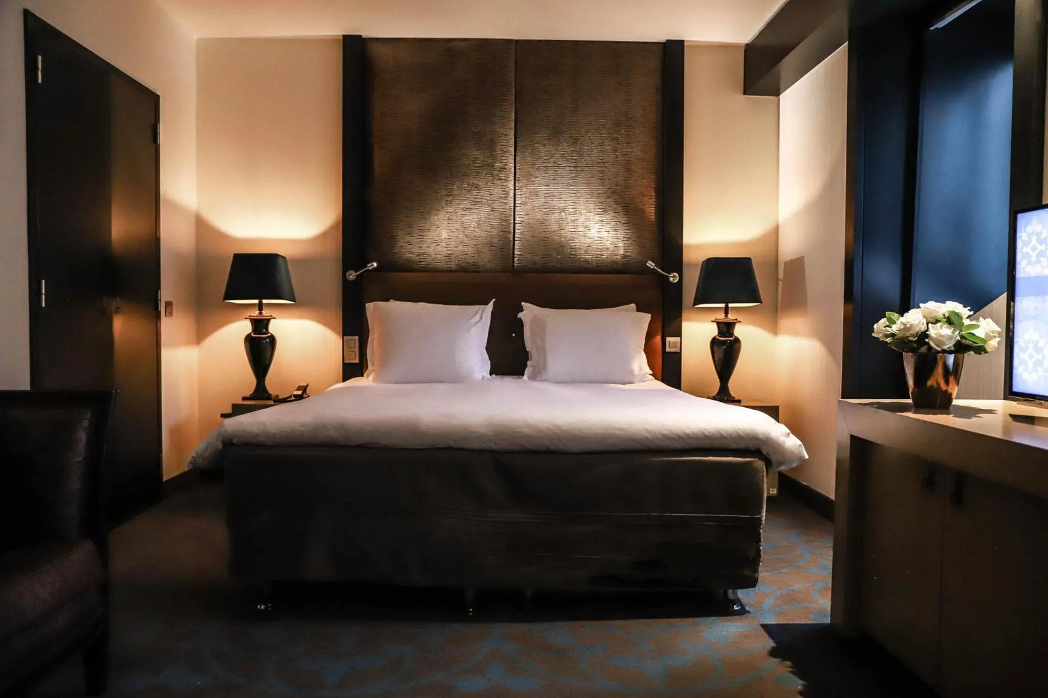 Bed in The Dominican, Brussels, a Member of Design Hotels