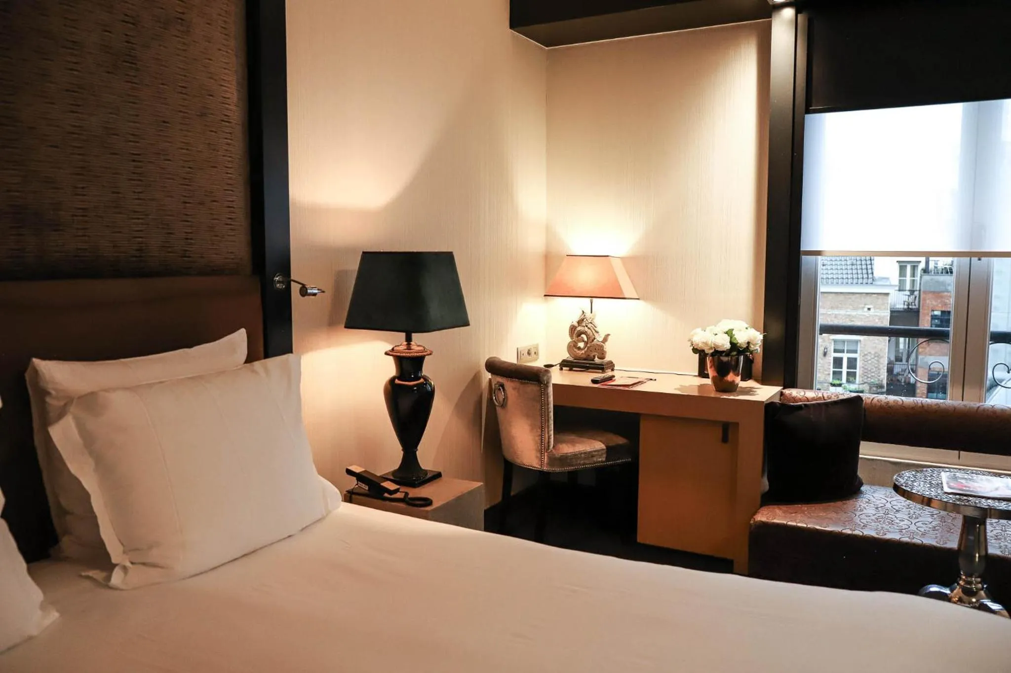 Bed in The Dominican, Brussels, a Member of Design Hotels