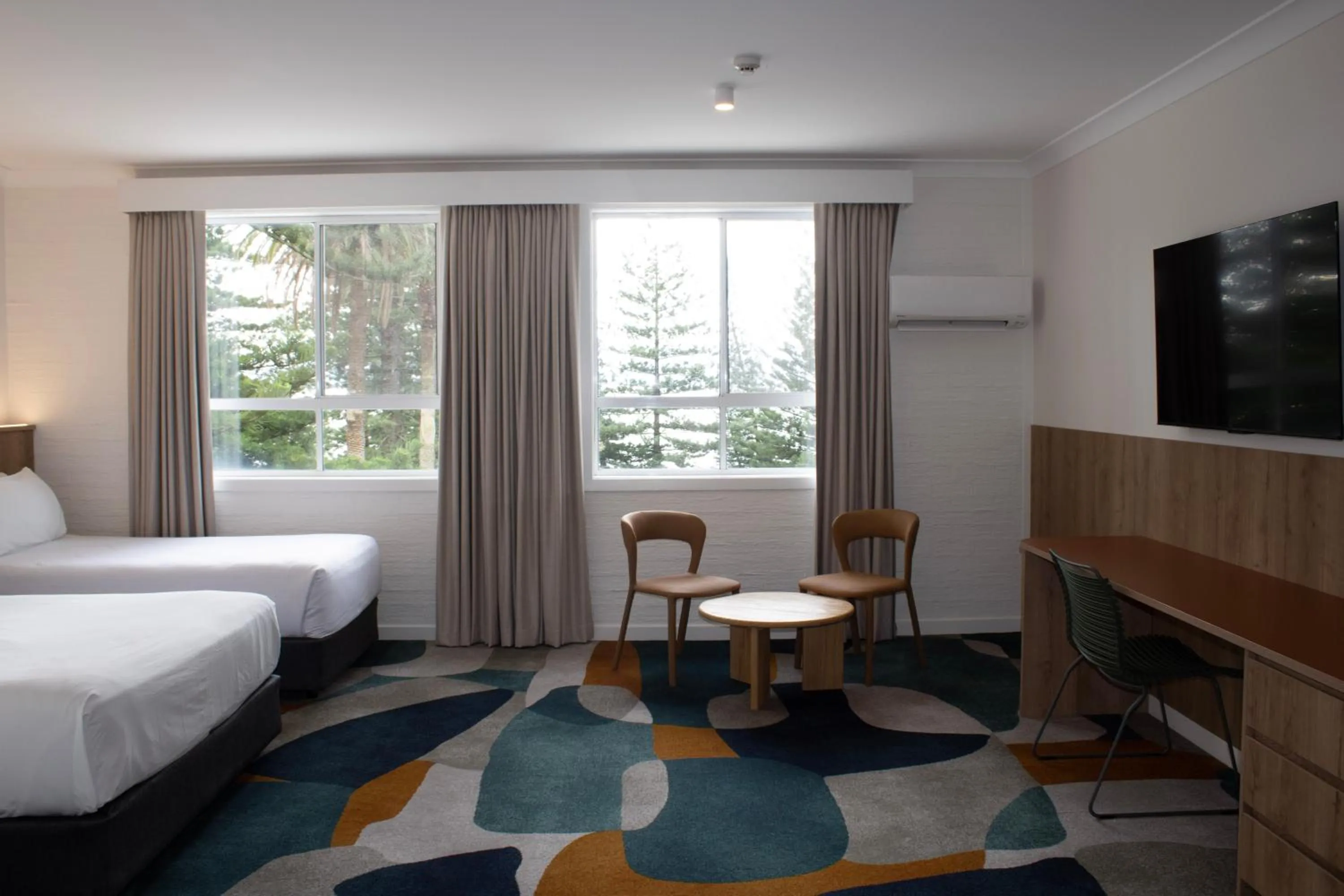 Bed in Seabreeze Beach Hotel