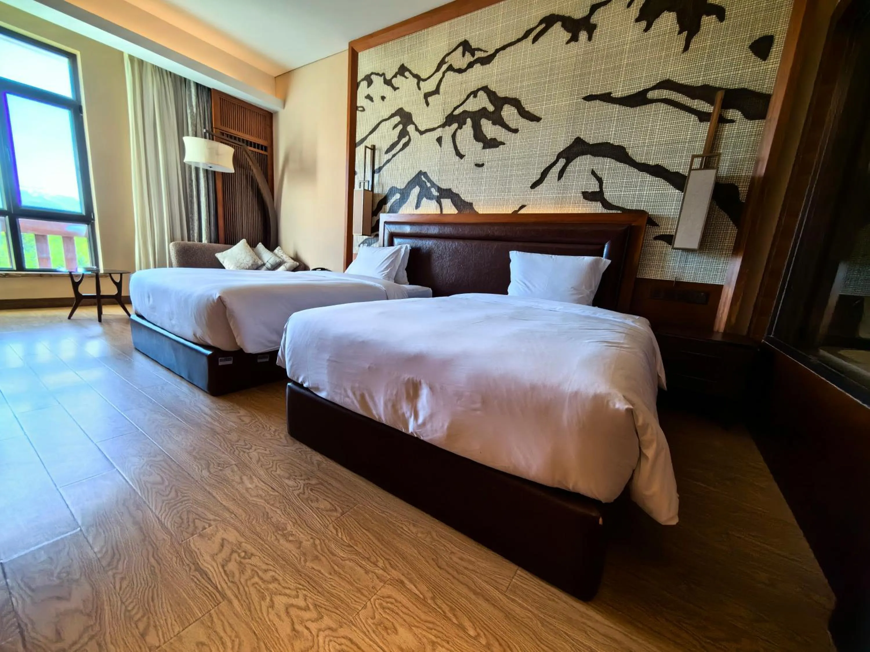 Bed in Crowne Plaza Resort Changbaishan Hot Spring by IHG