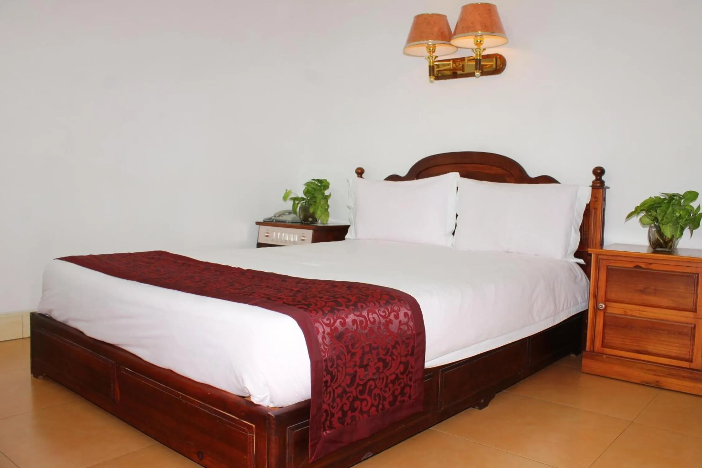 Bed in Evergreen Hotel