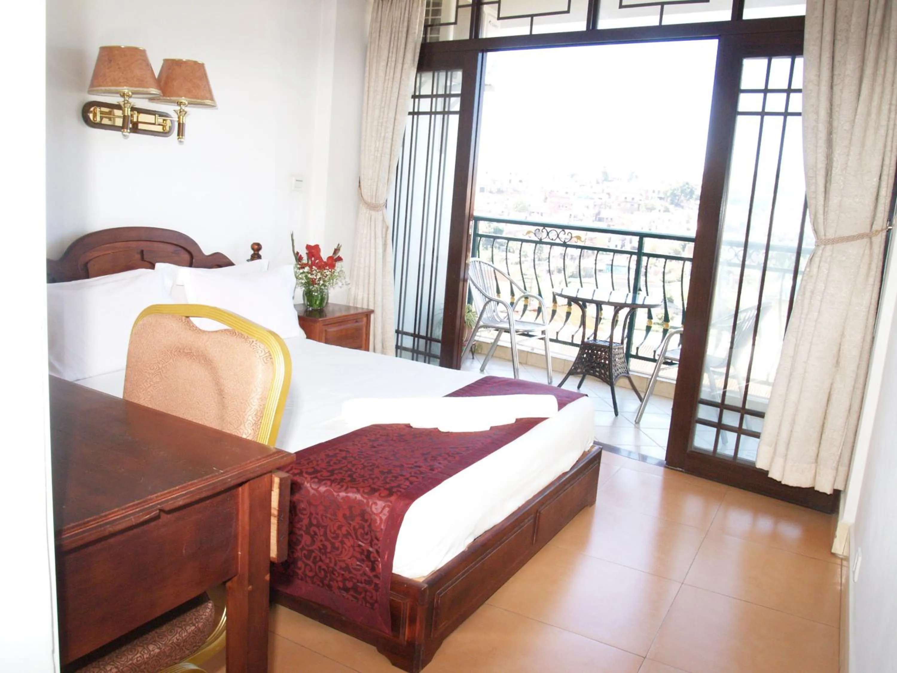 Bed in Evergreen Hotel