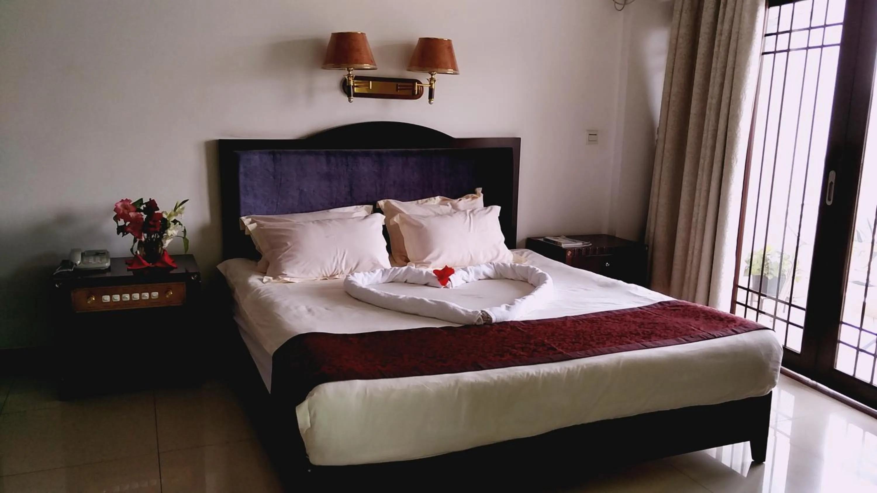 Bed in Evergreen Hotel