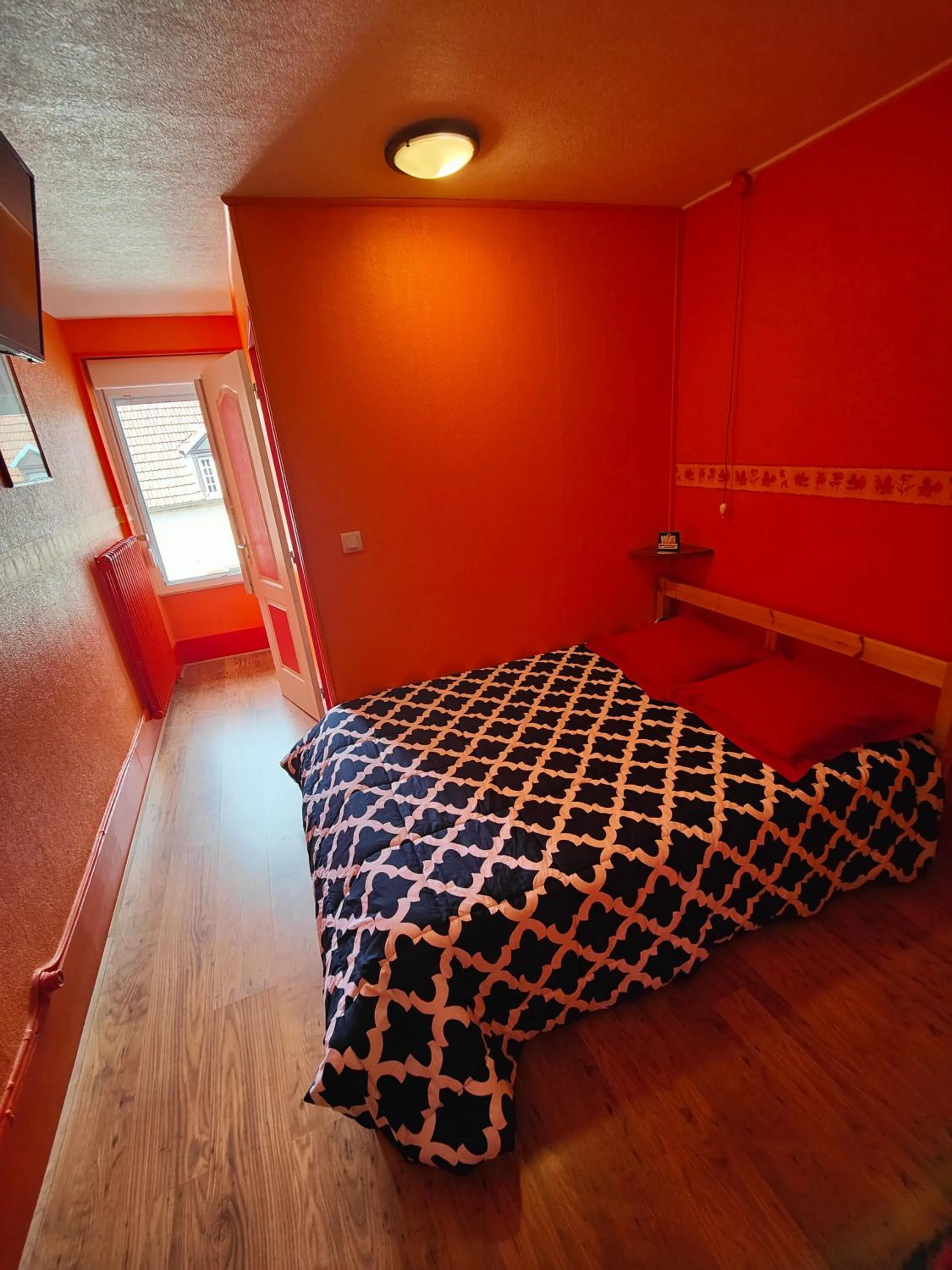 Bed in L'Hôtel du Mouton blanc