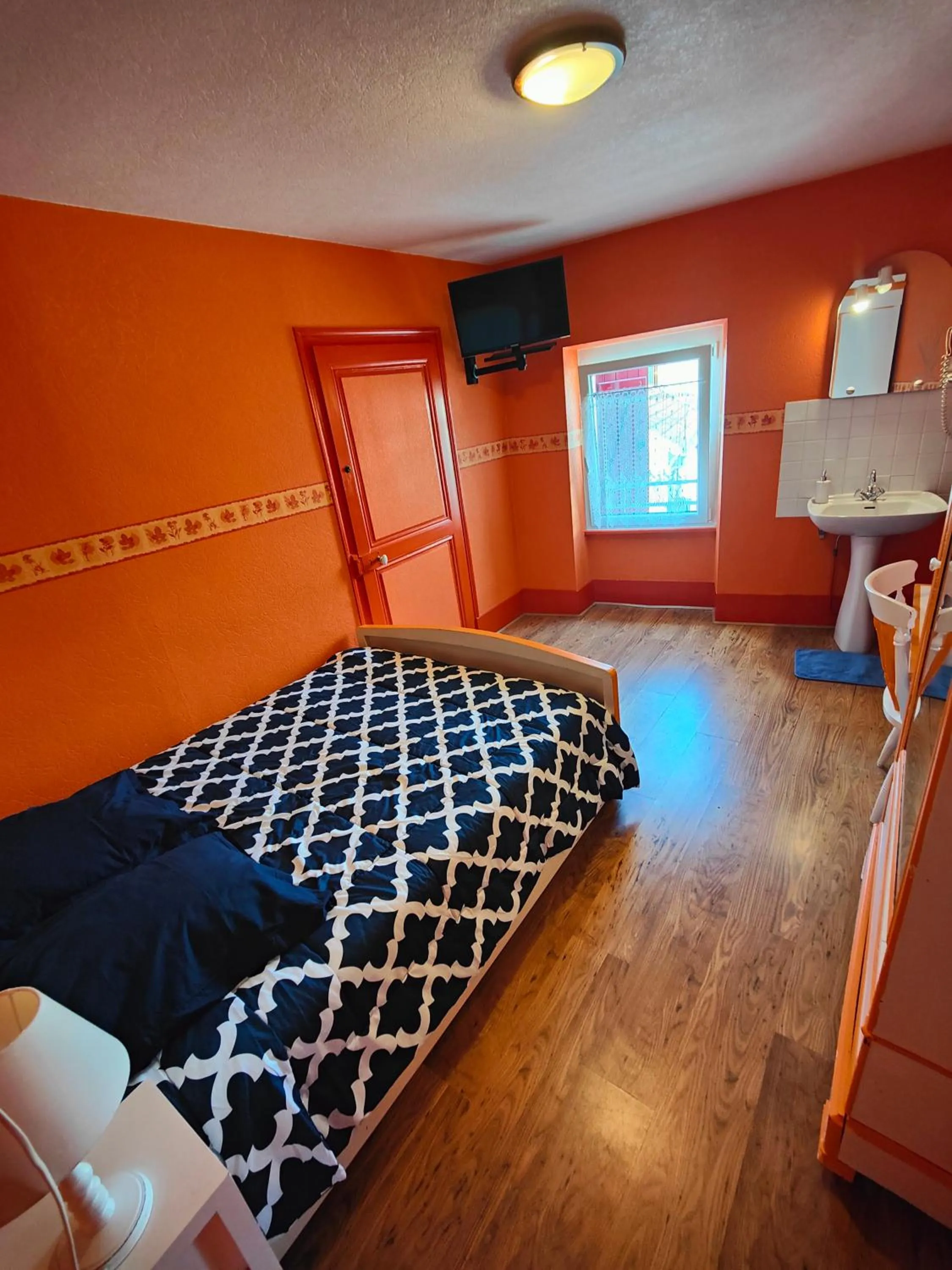 Bed in L'Hôtel du Mouton blanc