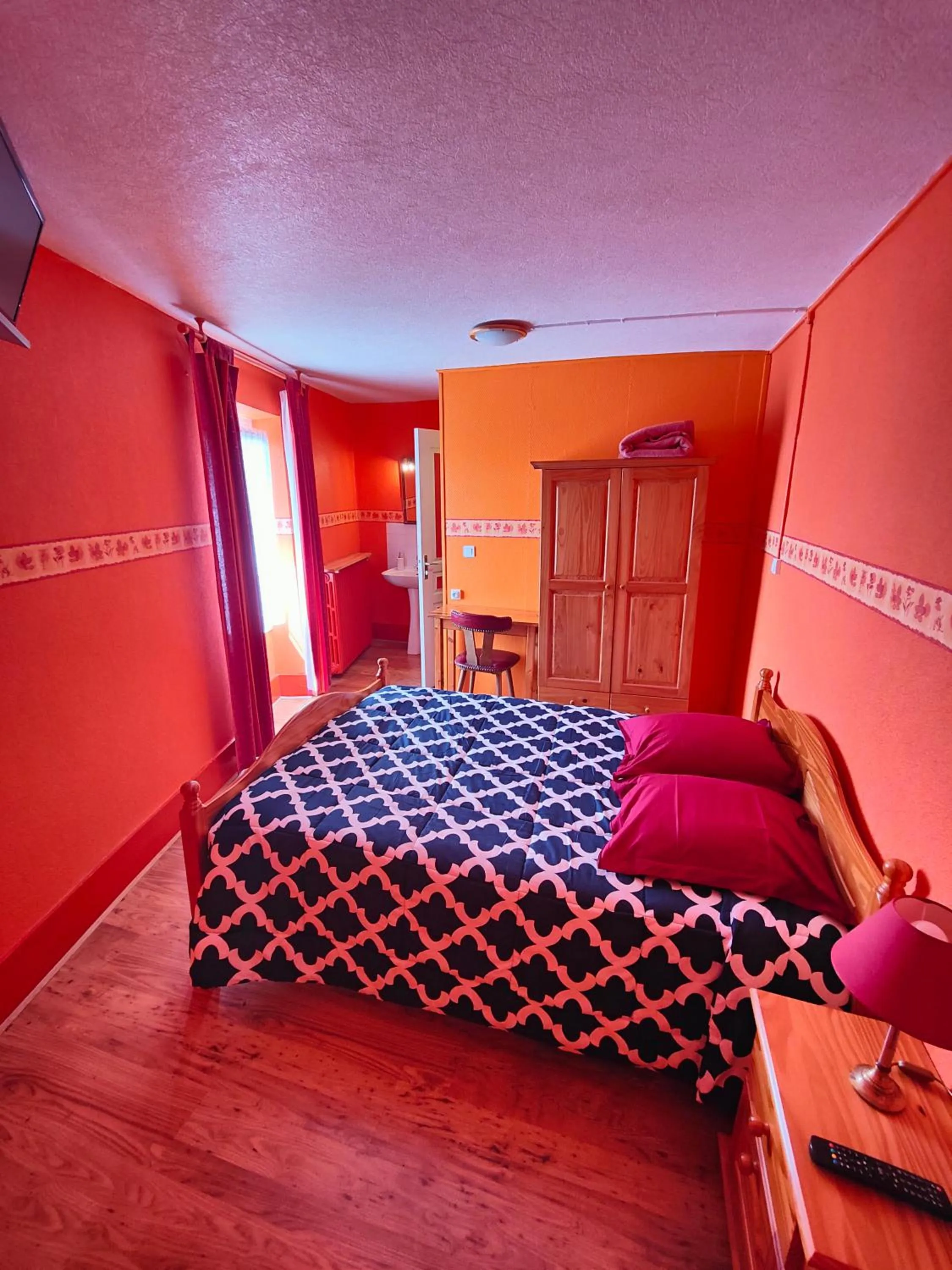 Bed in L'Hôtel du Mouton blanc