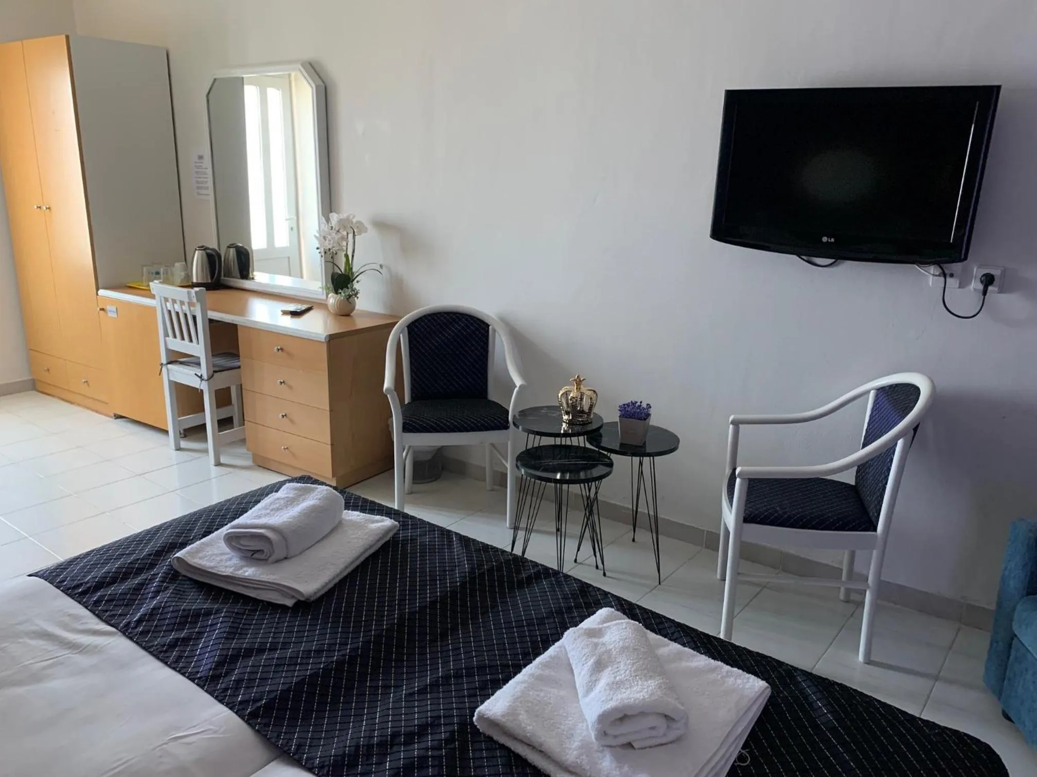 Bed in Alkyonides Boutique Hotel