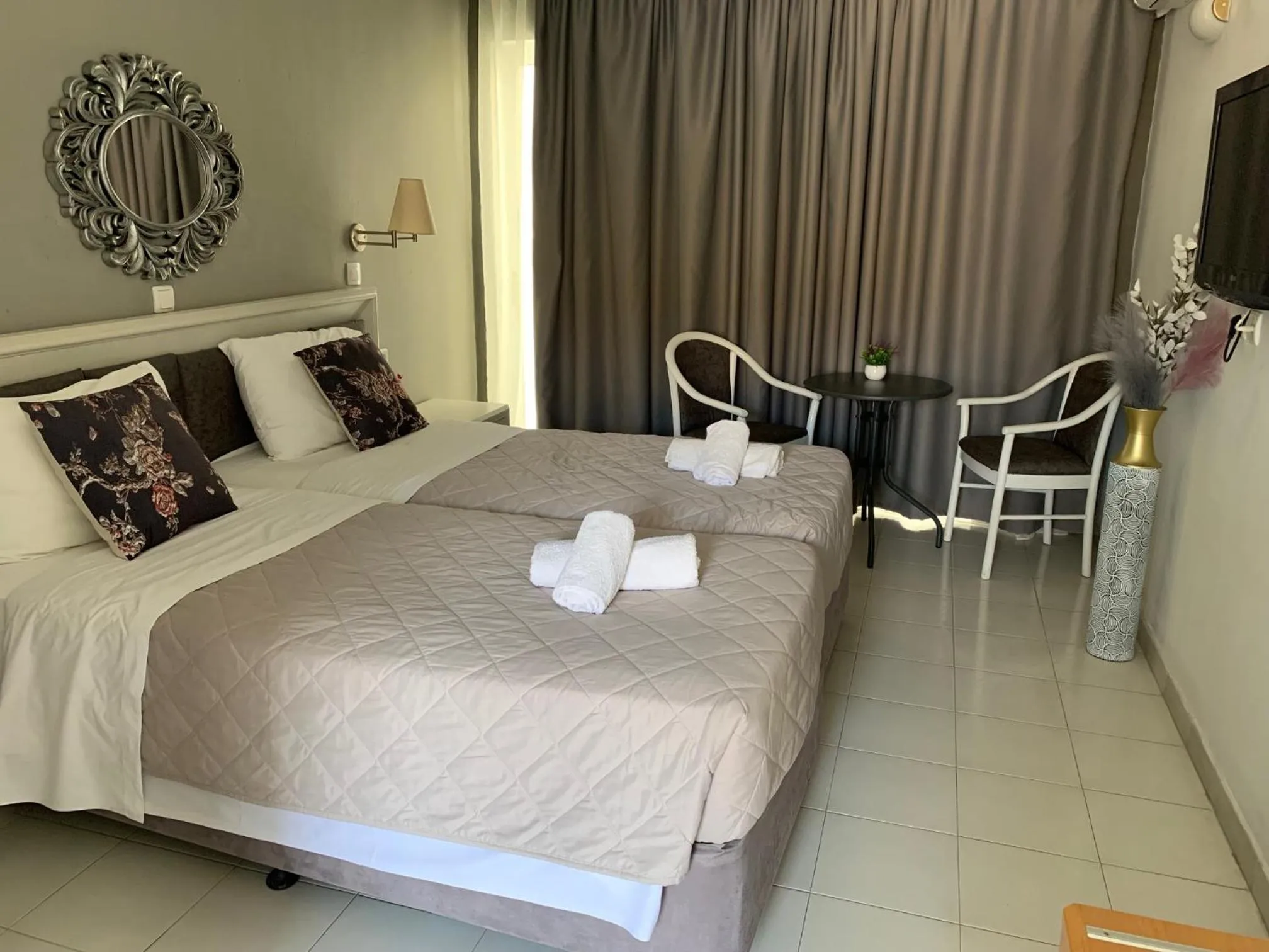 Bed in Alkyonides Boutique Hotel