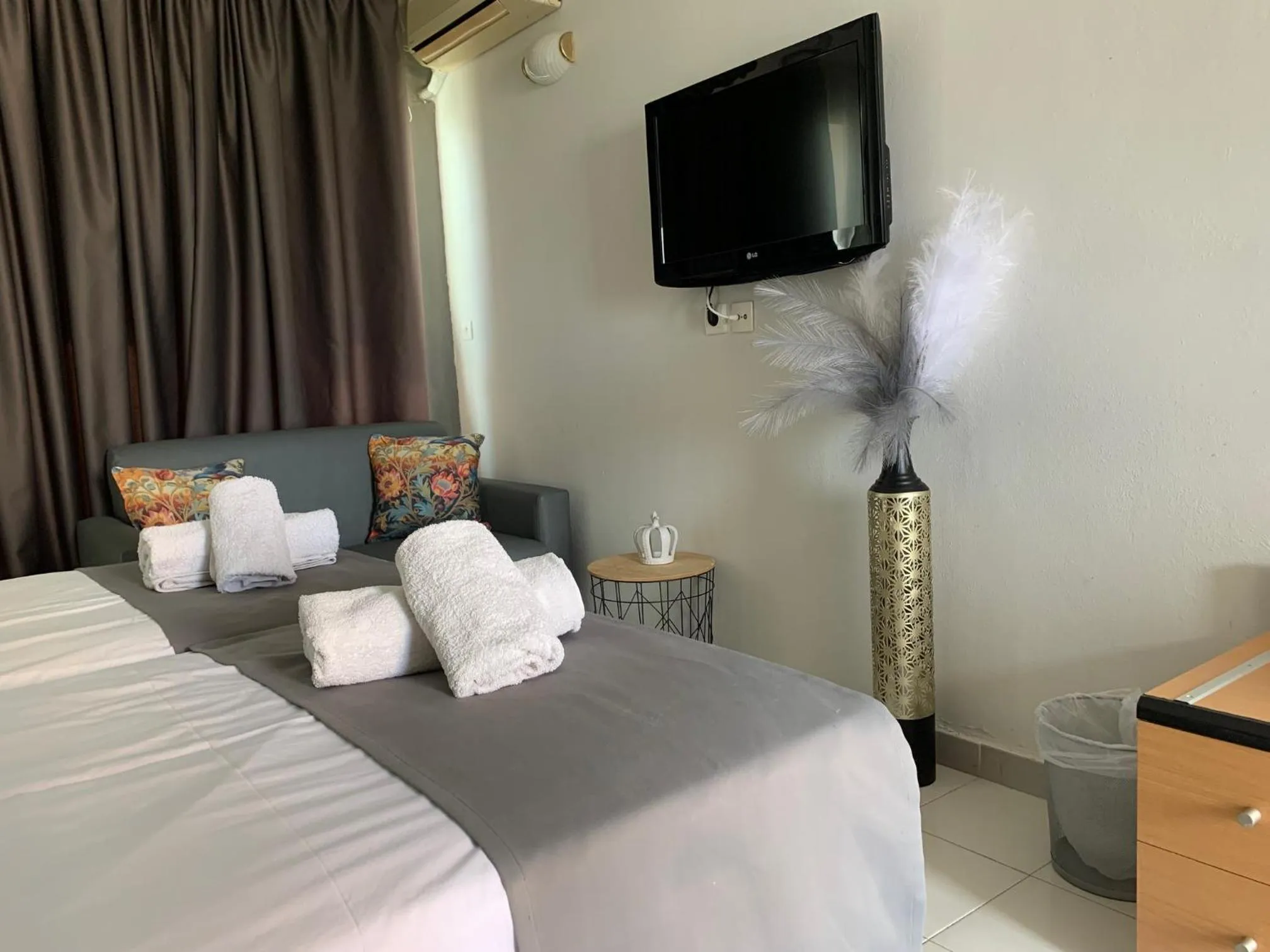 Bed in Alkyonides Boutique Hotel