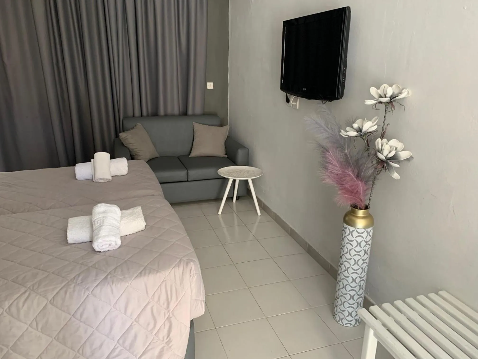 Bed in Alkyonides Boutique Hotel