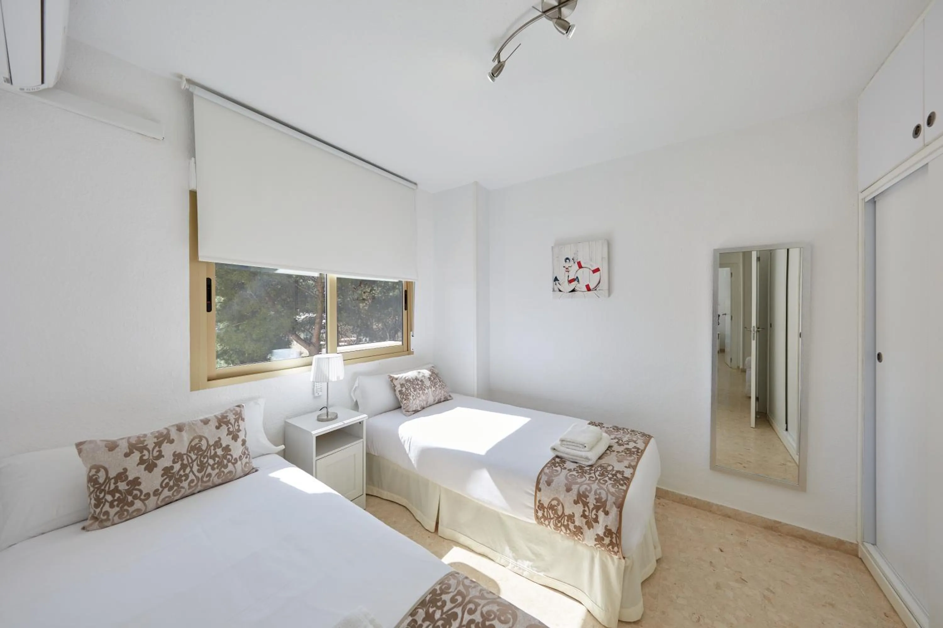 Bed in Sonrisa Apartments