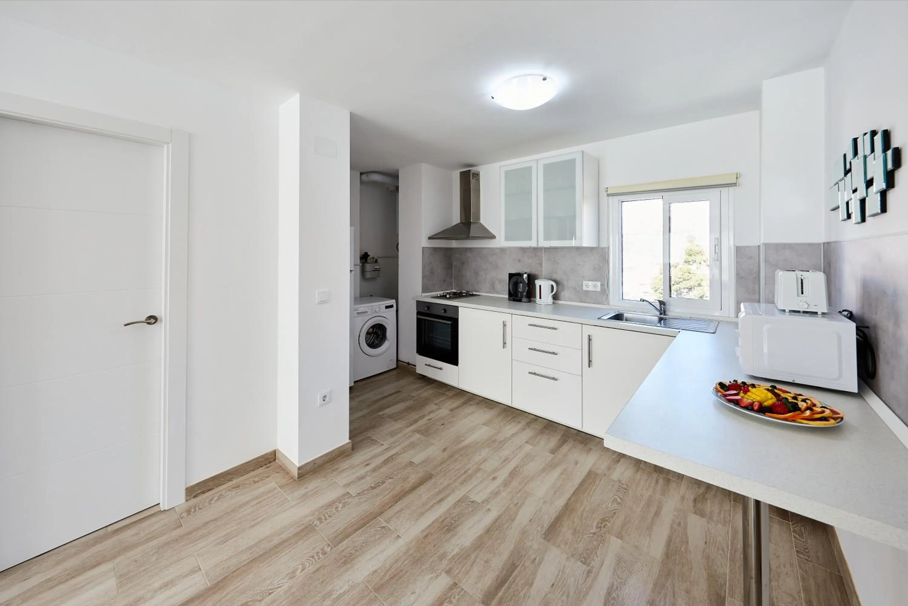 Communal kitchen in Sonrisa Apartments