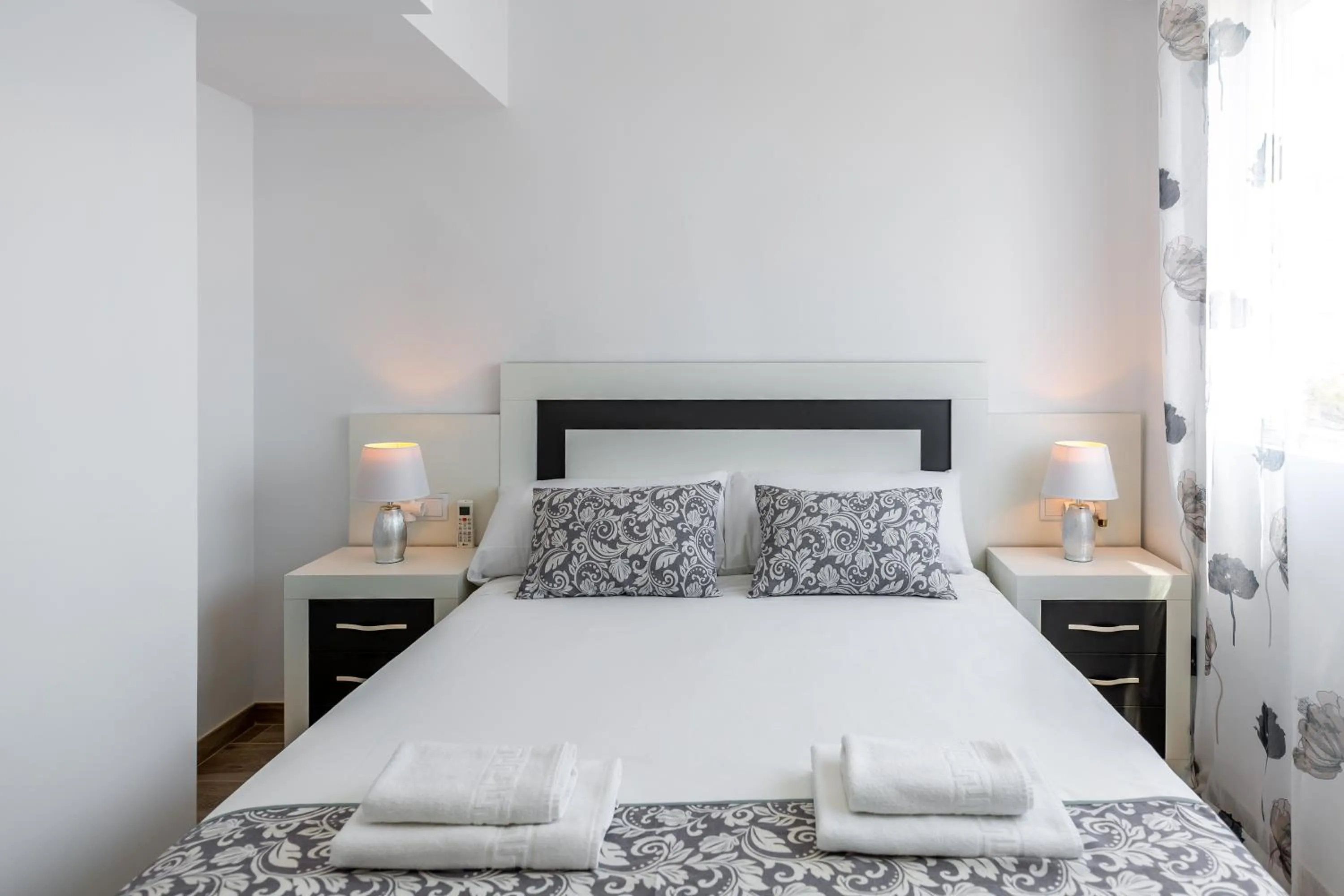 Bed in Sonrisa Apartments