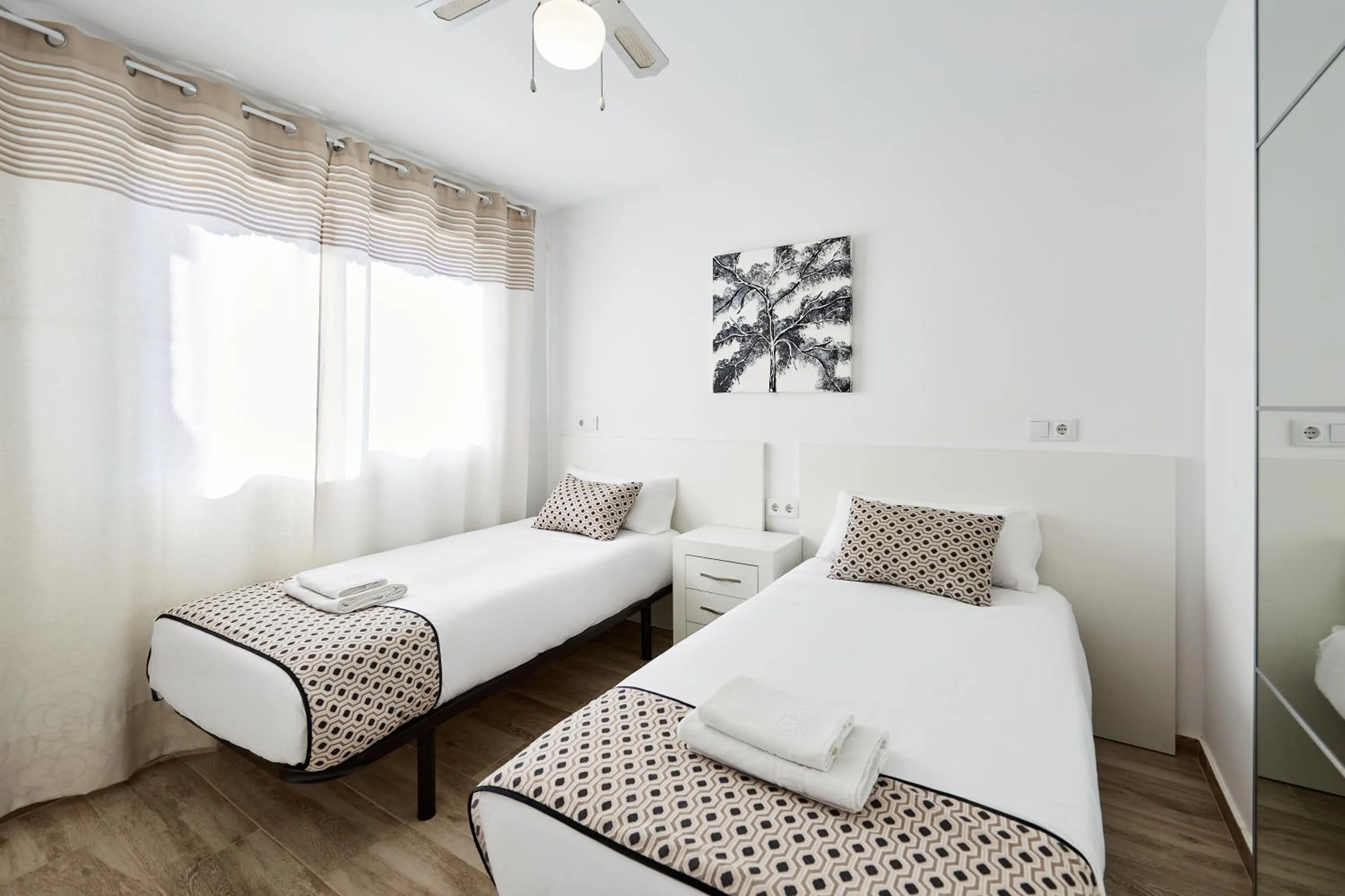 Bed in Sonrisa Apartments
