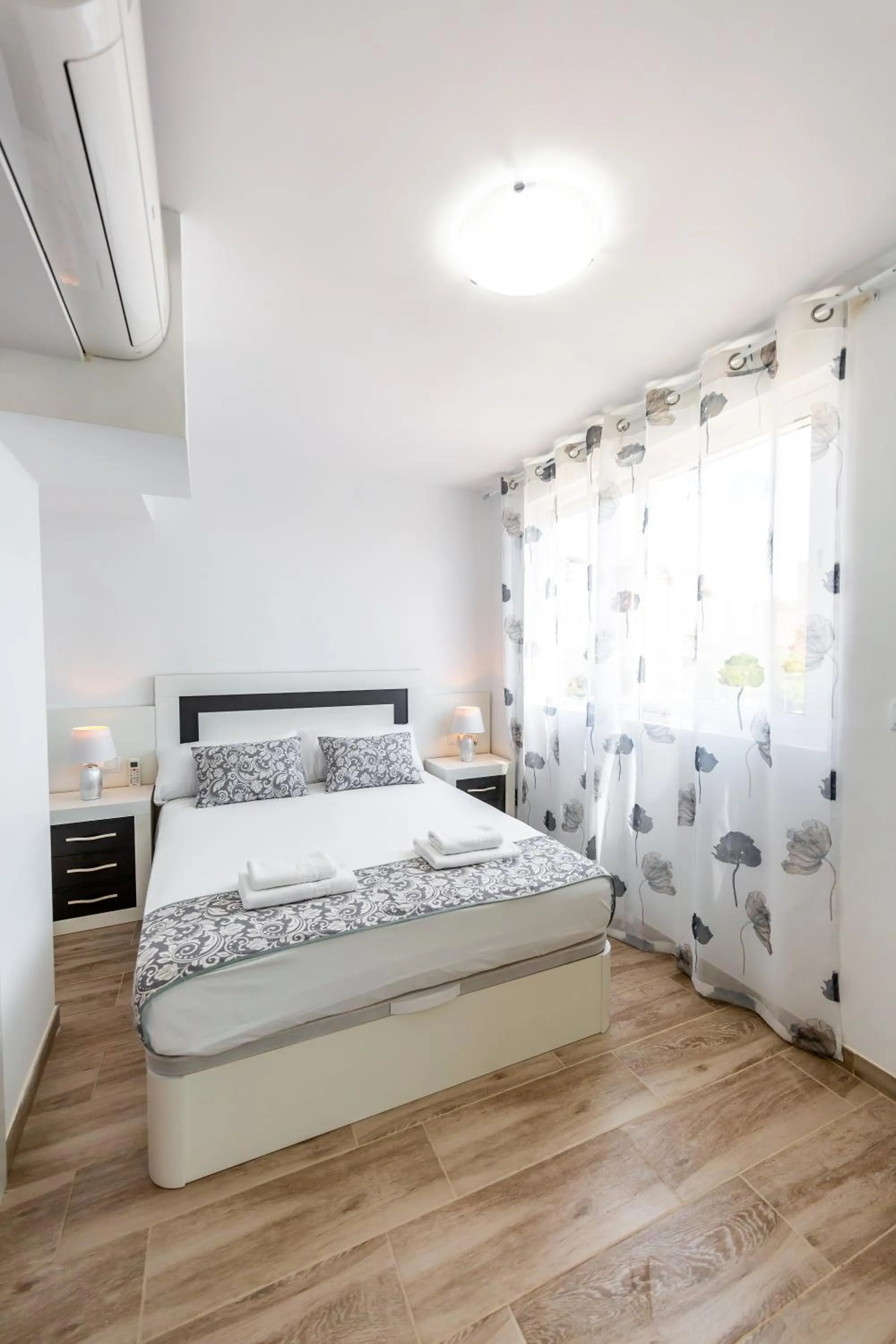 Bed in Sonrisa Apartments