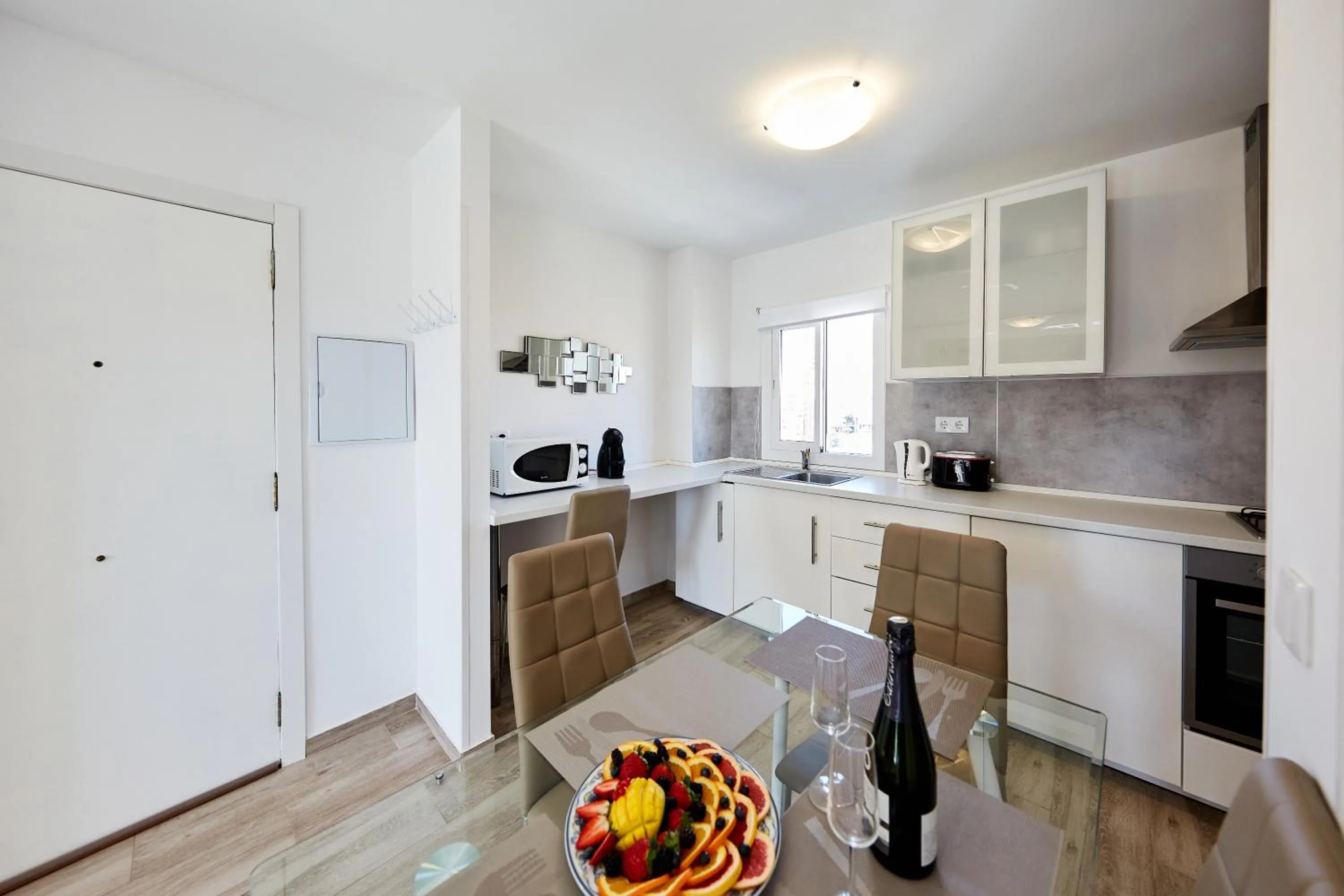 Kitchen or kitchenette in Sonrisa Apartments
