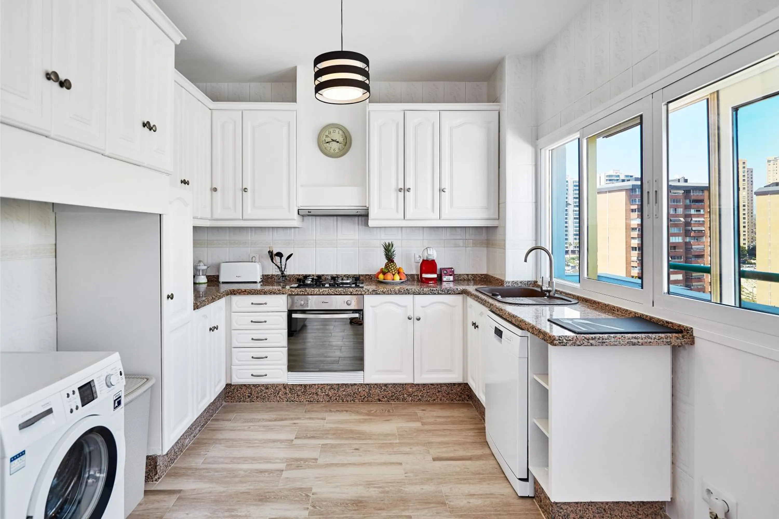 Kitchen or kitchenette in Sonrisa Apartments