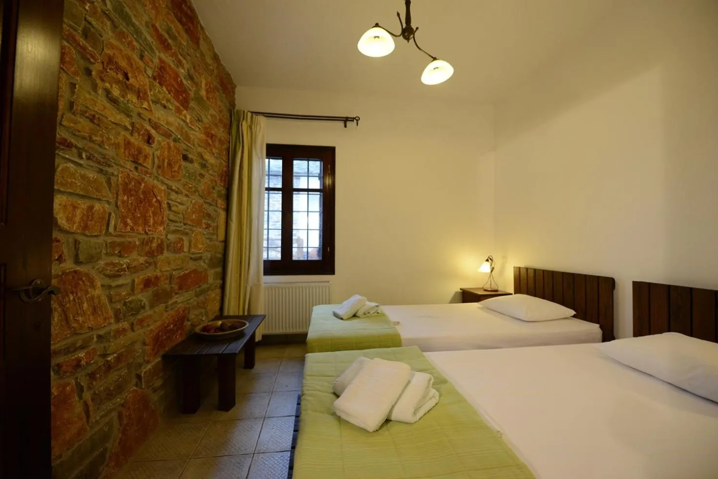 Bed in Esperos Suites & Villas