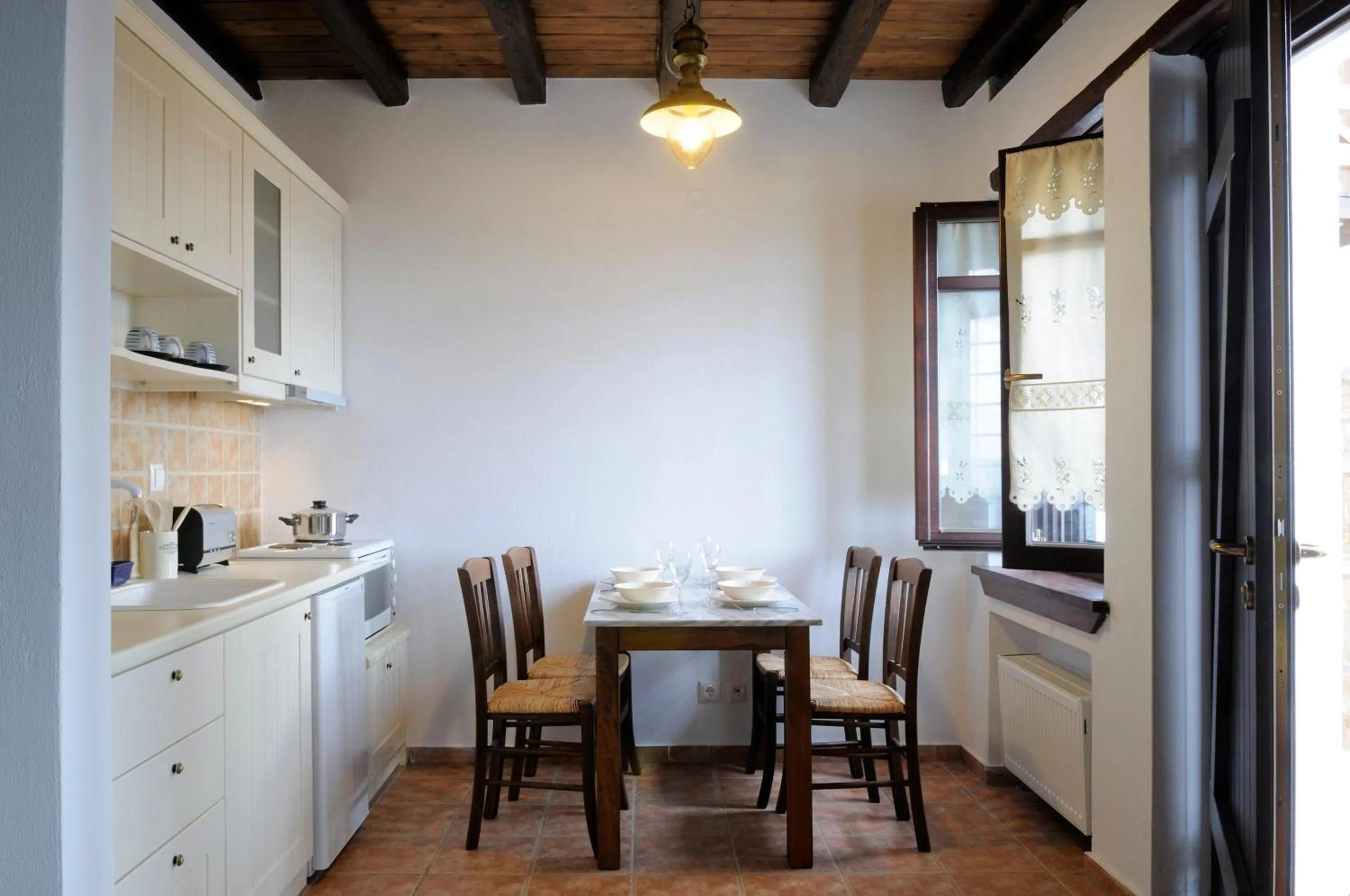 Kitchen or kitchenette in Esperos Suites & Villas