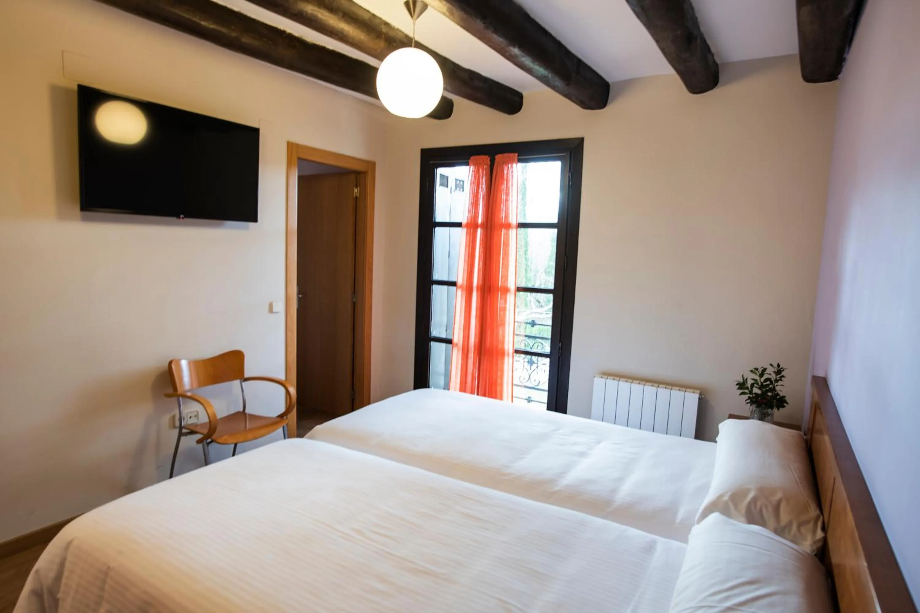 Bed in La Pedanía Hotel Y Bungalows - Ligüerre de Cinca