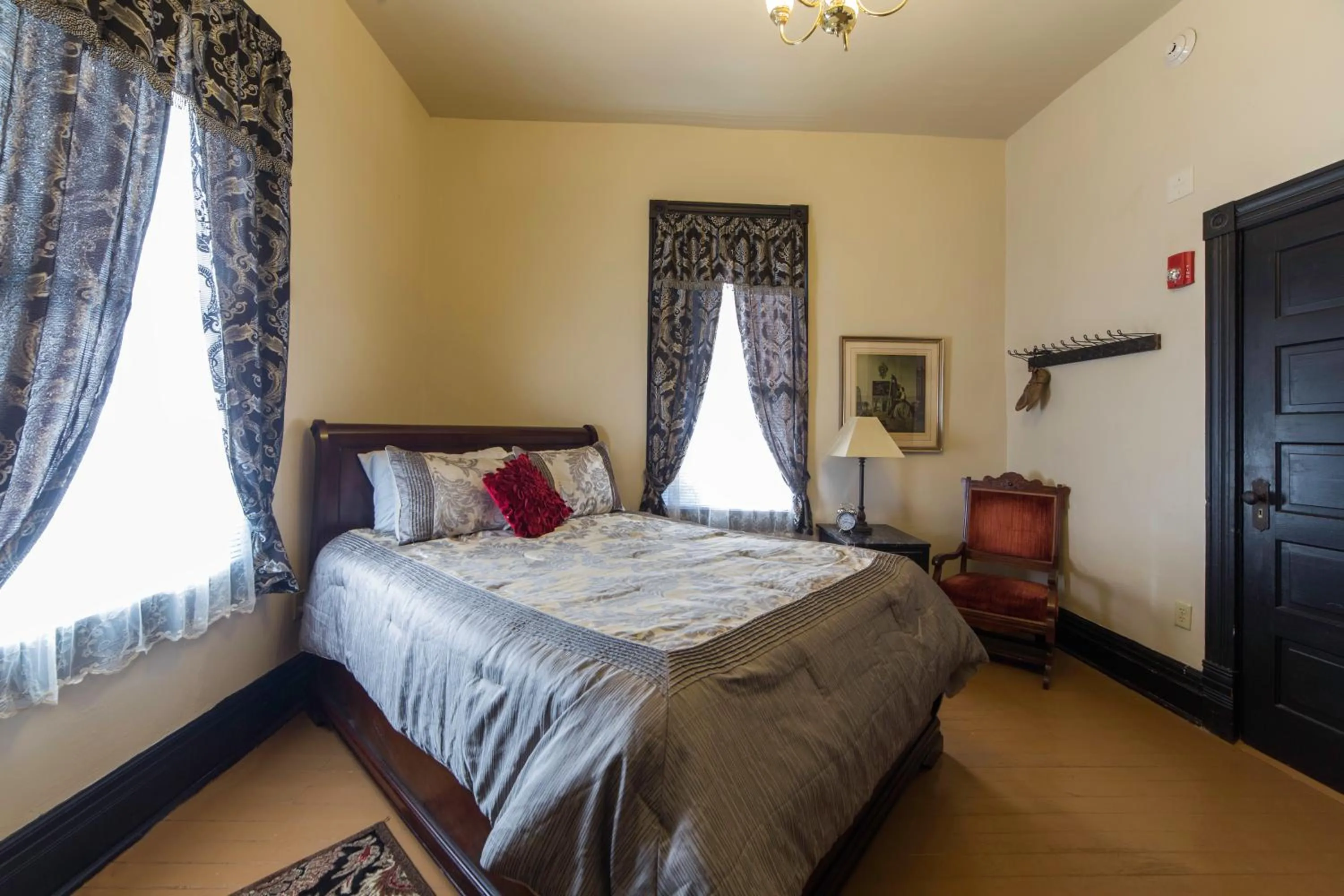 Decorative detail, Bed in Grand Victorian Inn