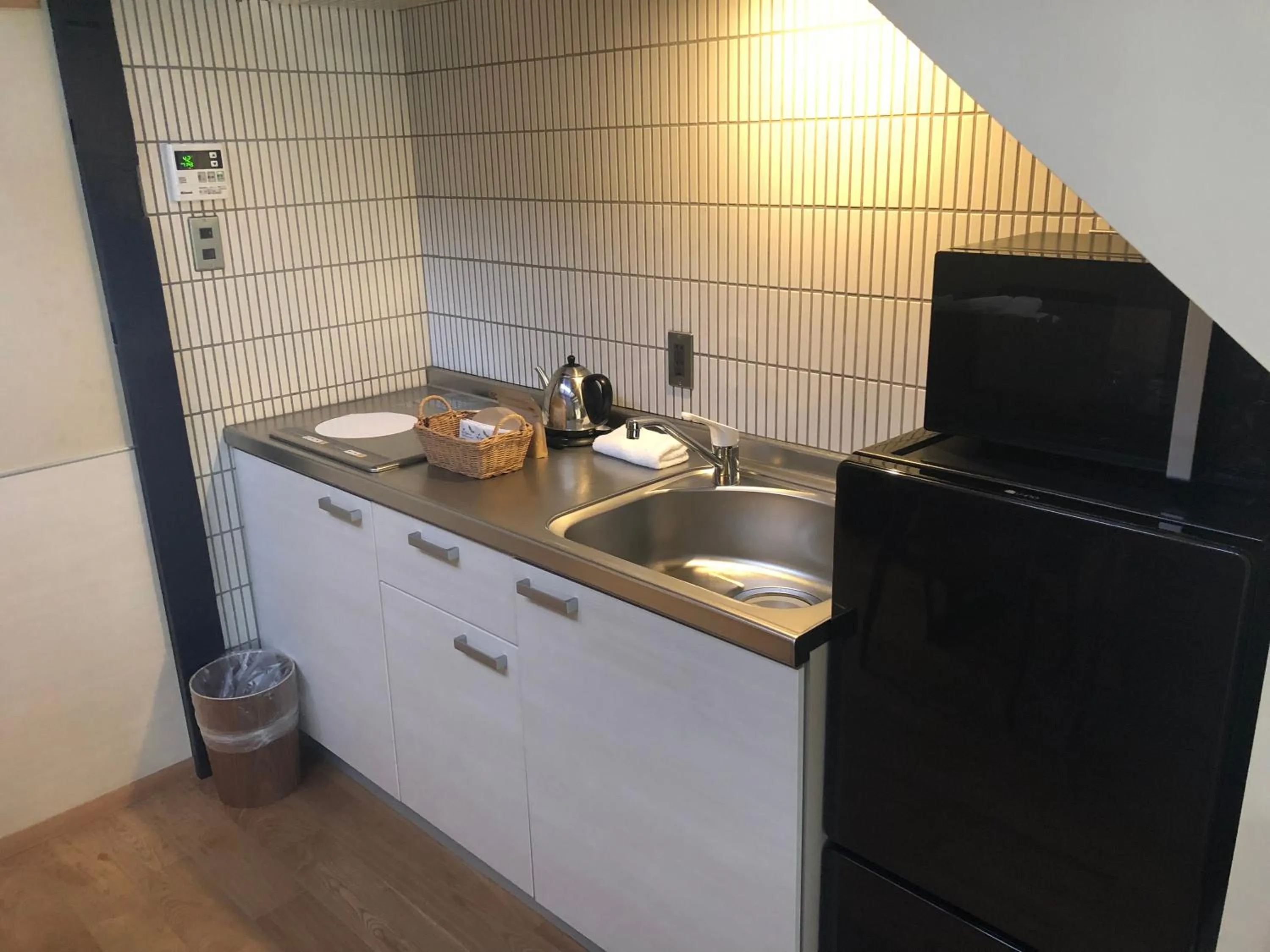 Kitchen or kitchenette in Shimabara Kaiden Machiya House