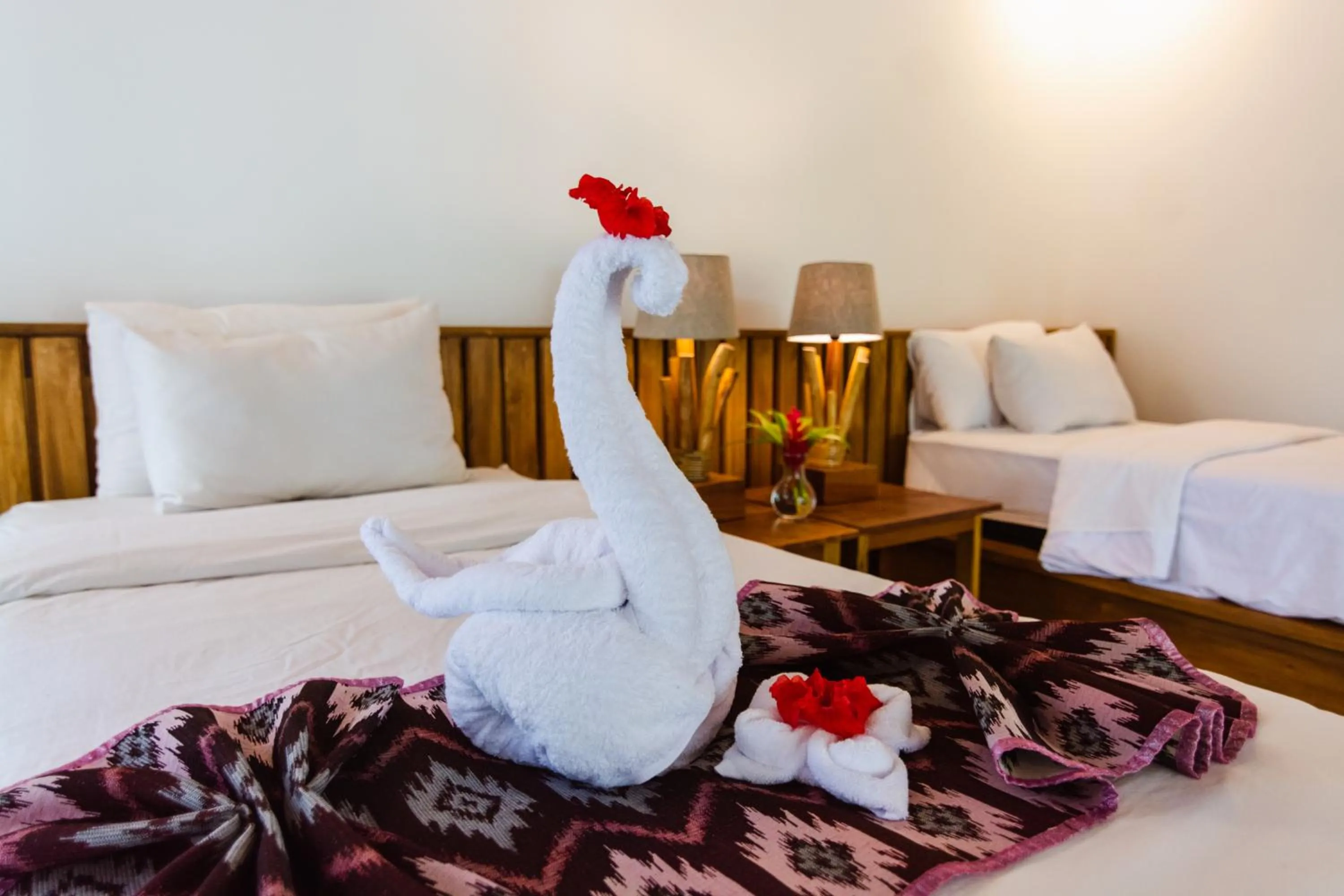 Bed in Murex Dive Resort