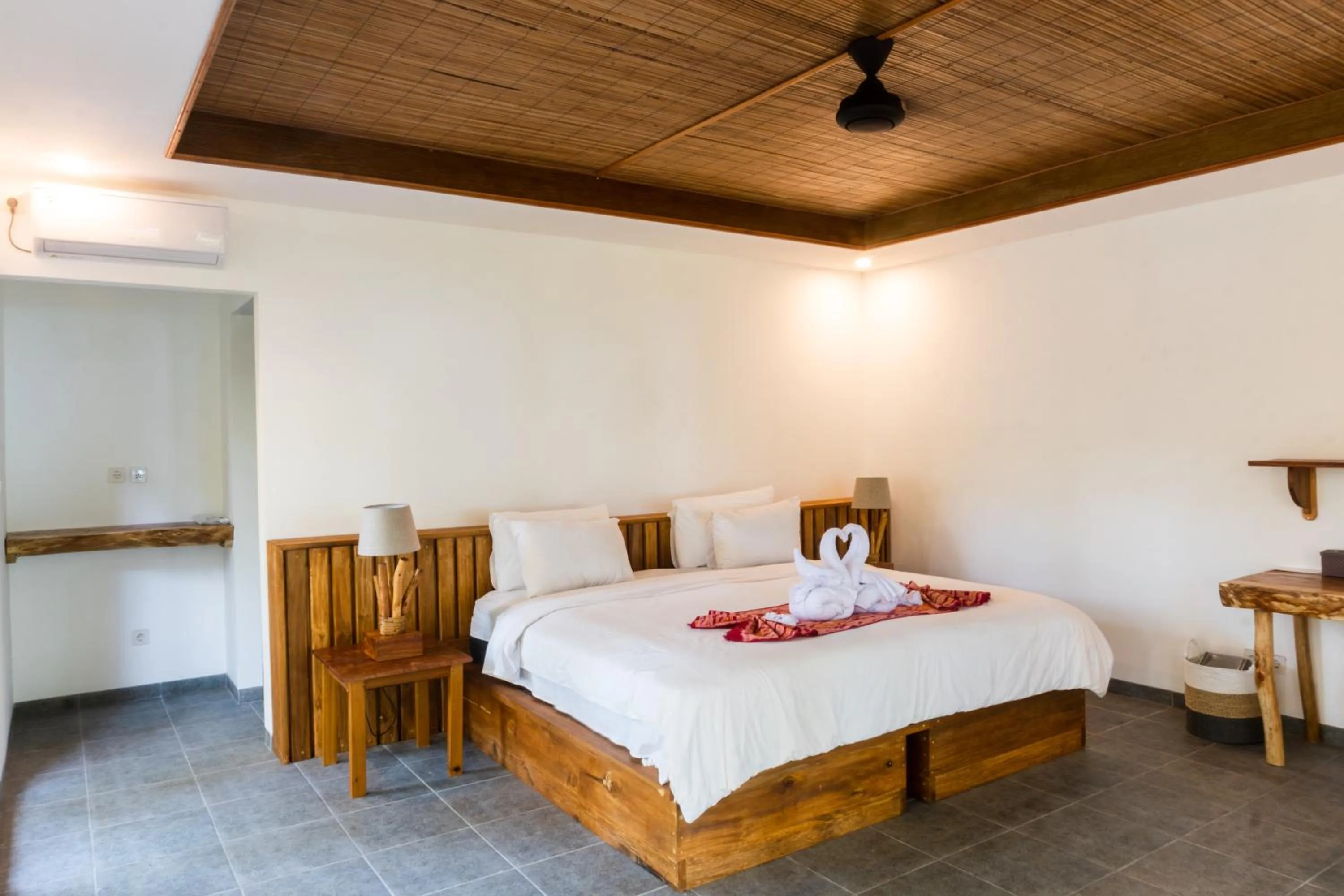 Bed in Murex Dive Resort