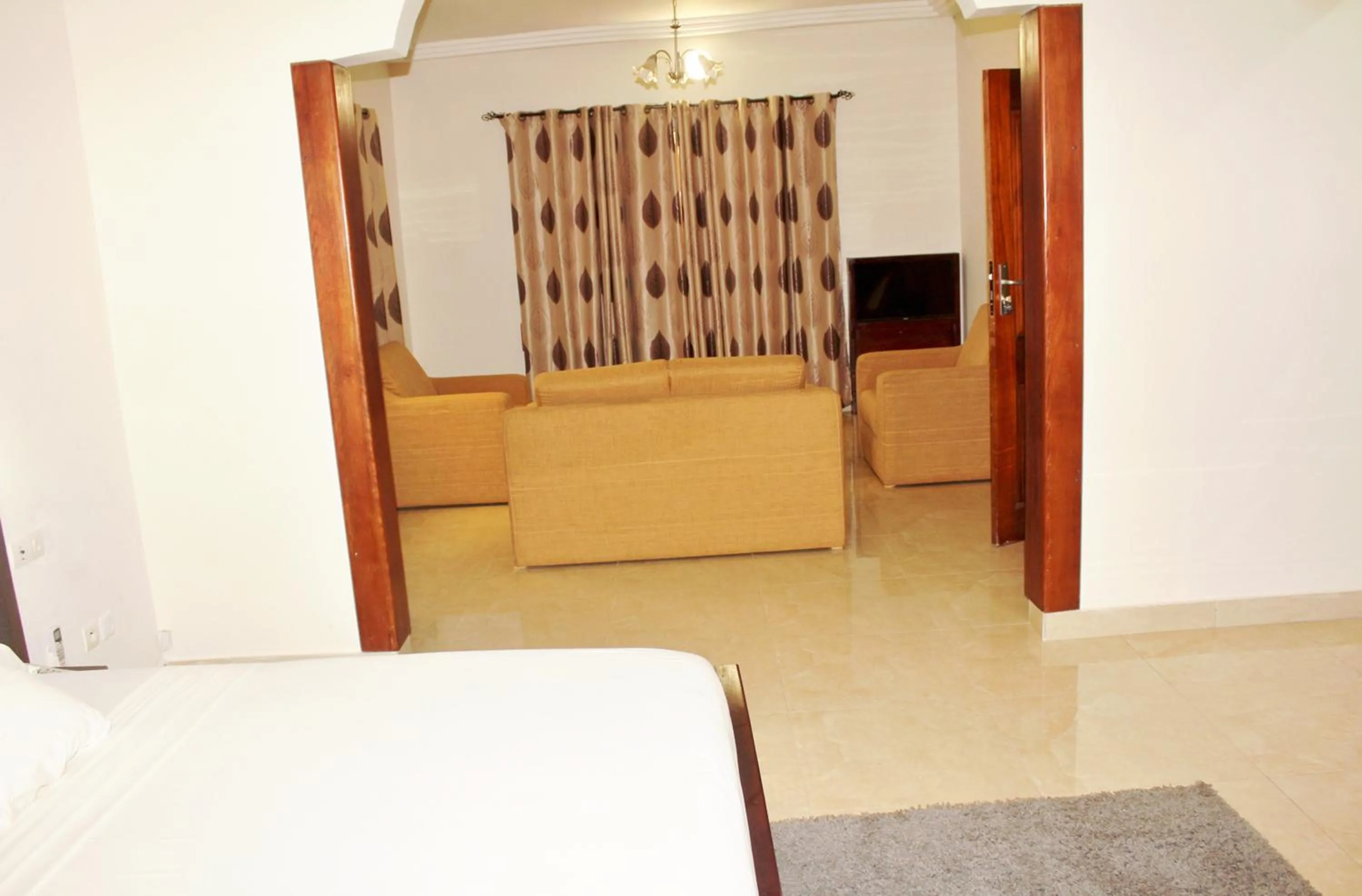 Living room, Bed in Hotel Ganiela