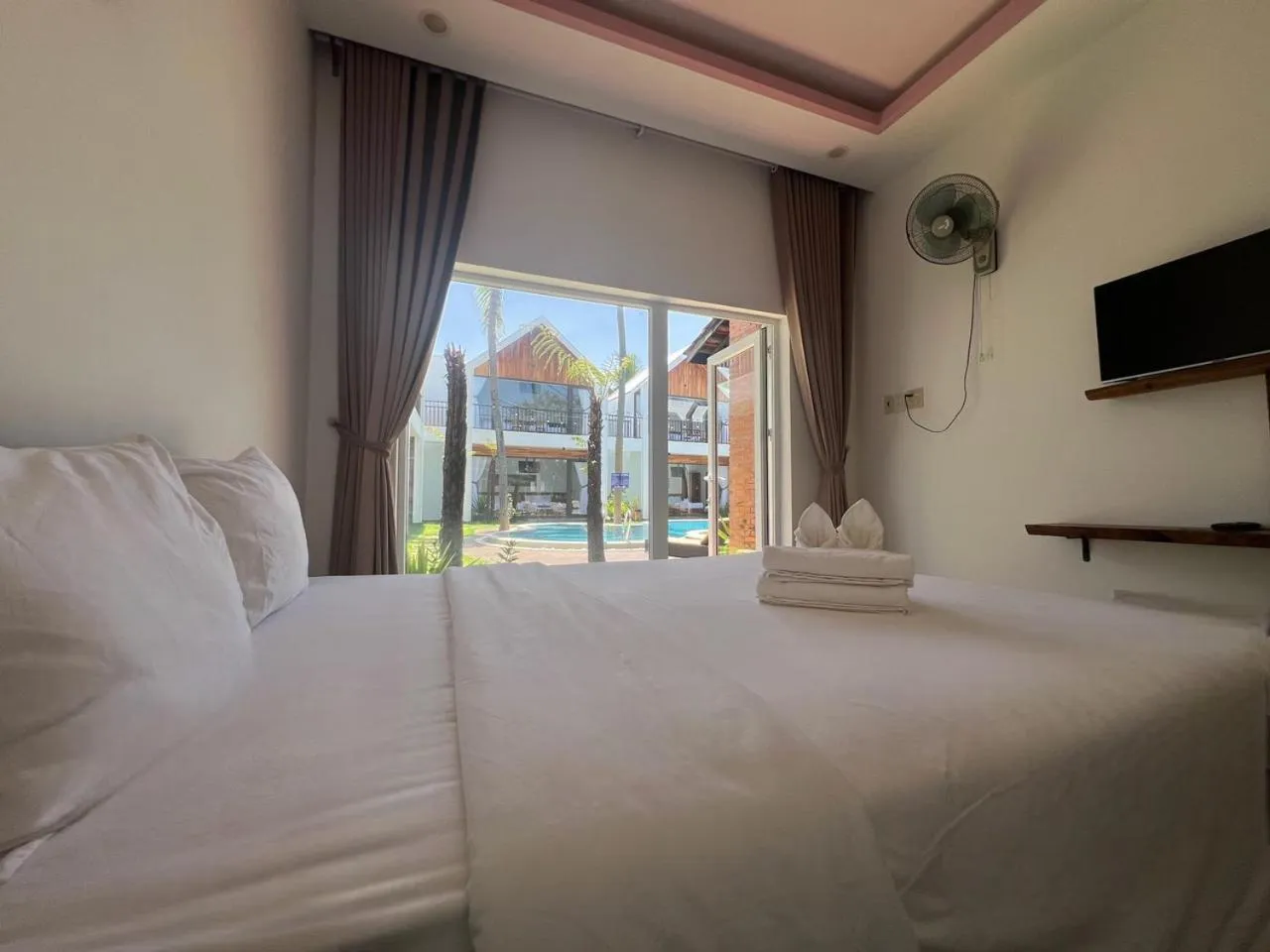Photo of the whole room, Bed in Tuong Vy Boutique Hotel Mui Ne