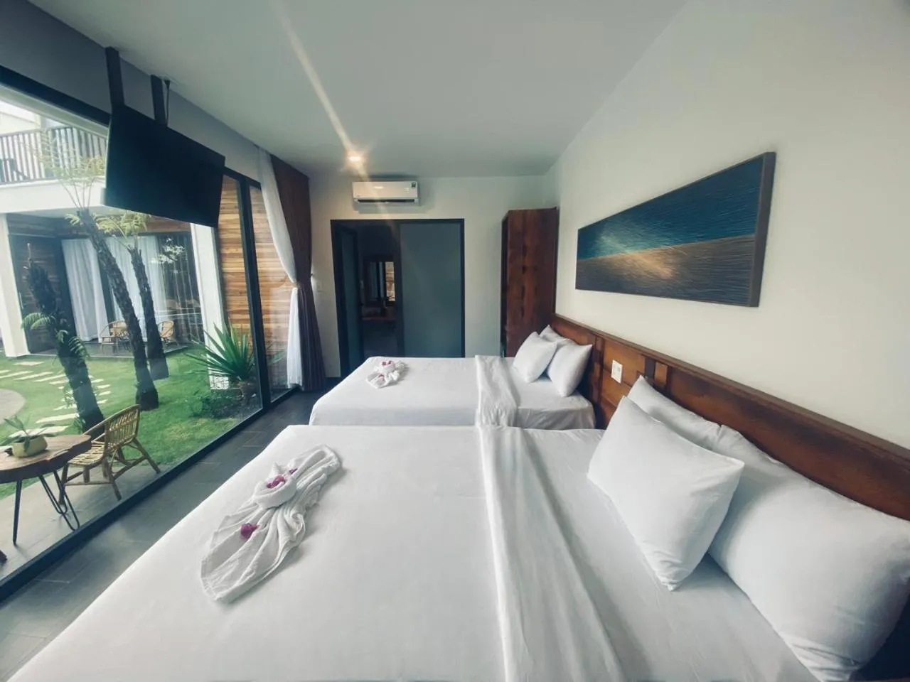 Photo of the whole room, Bed in Tuong Vy Boutique Hotel Mui Ne