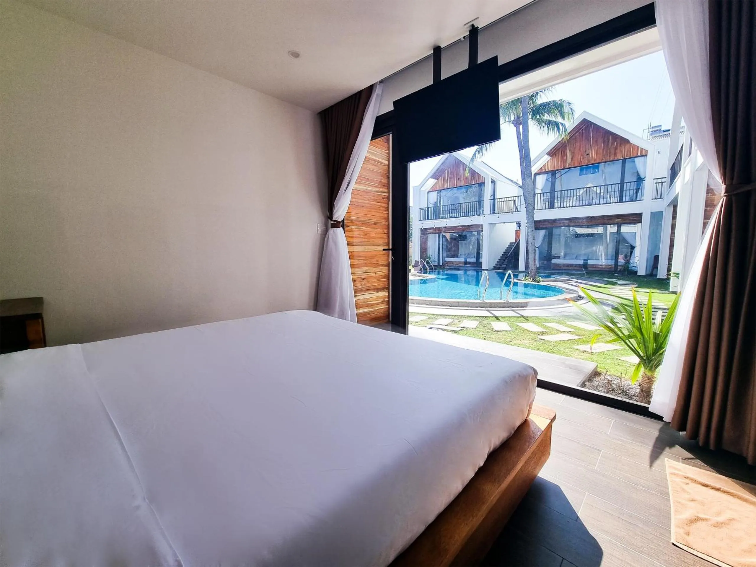 Photo of the whole room, Bed in Tuong Vy Boutique Hotel Mui Ne