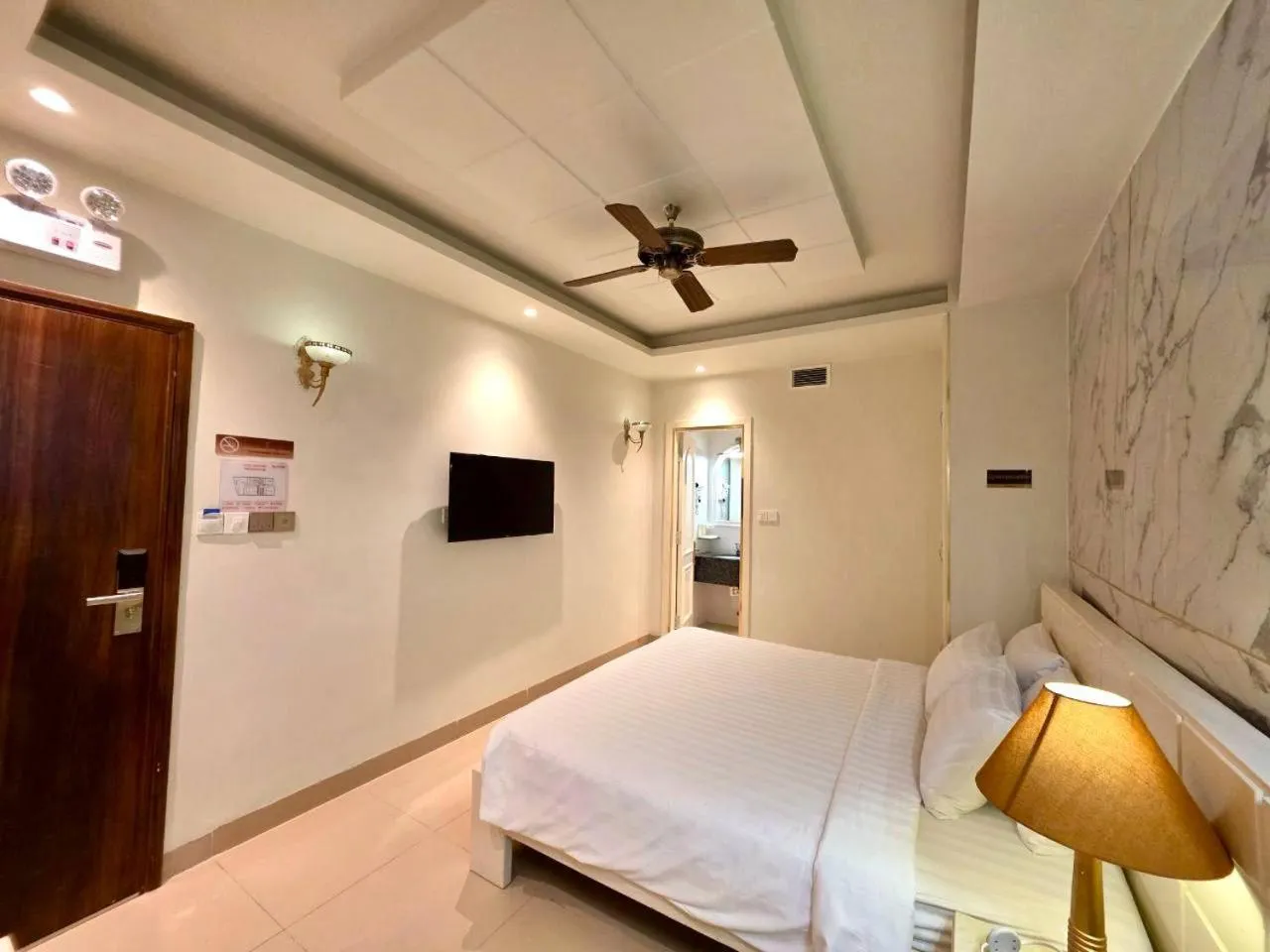 Bed in Tulip Hotel 3