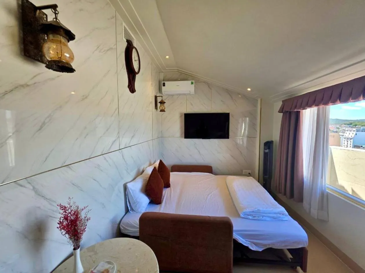 Bed in Tulip Hotel 3