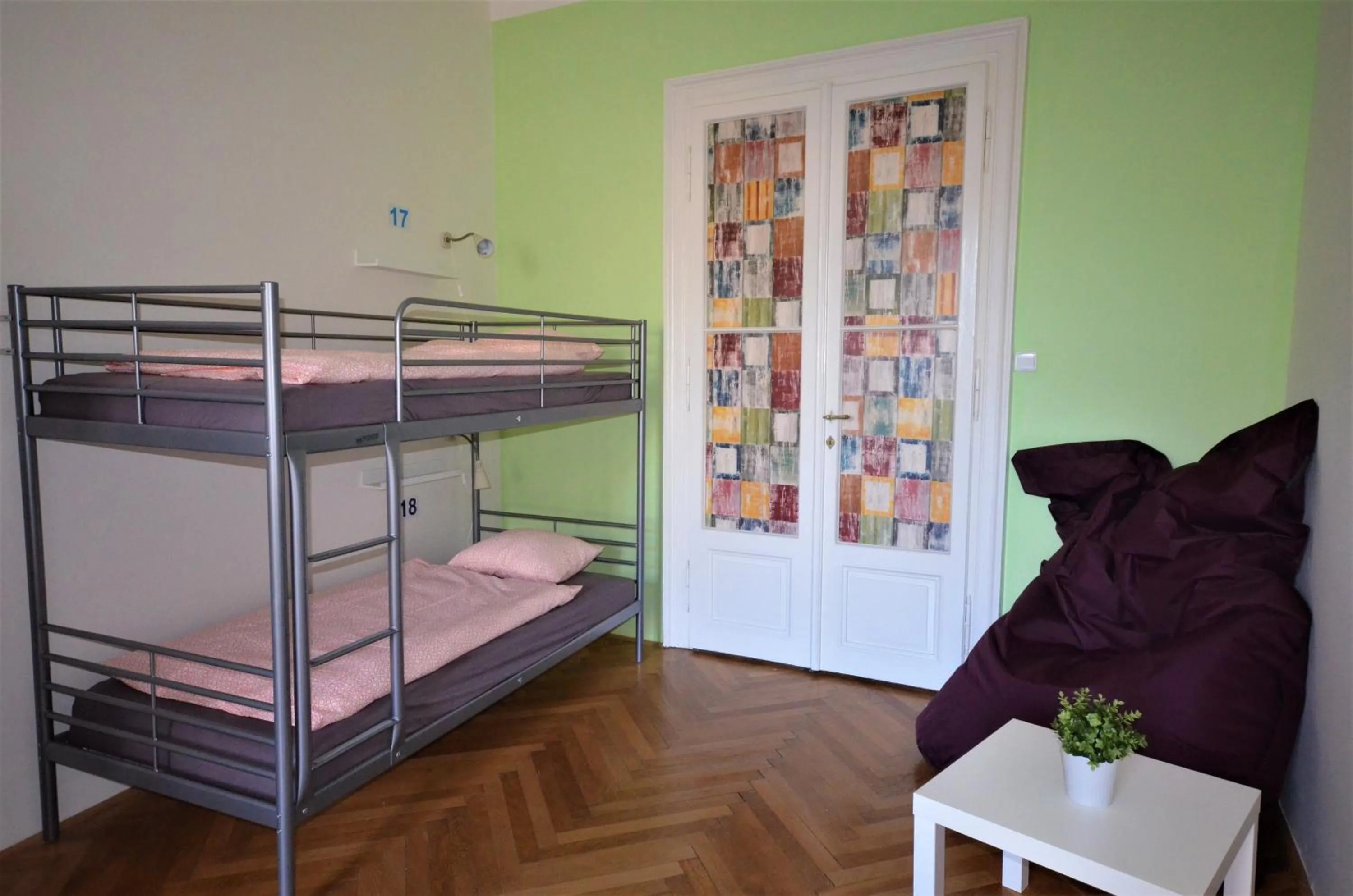 Seating area, Bed in Travel&Joy backpackers