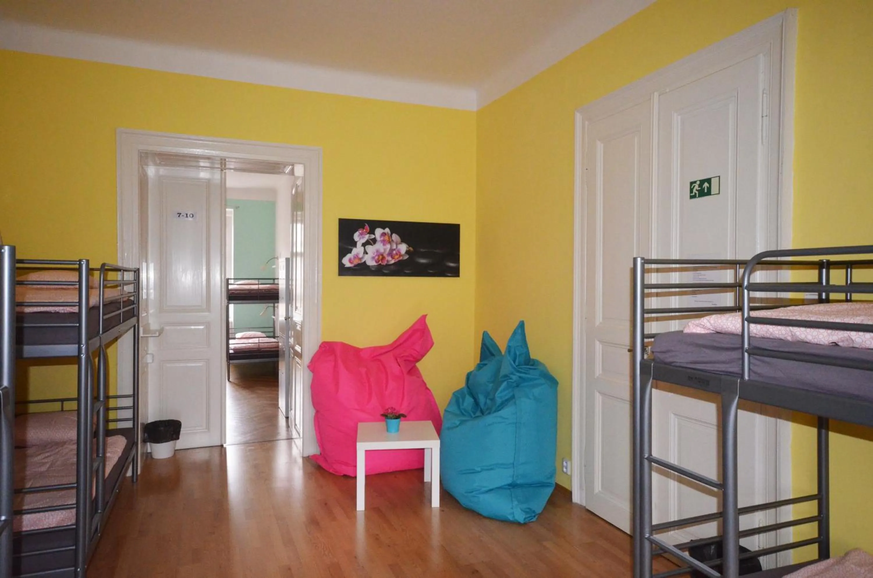 Seating area, Bed in Travel&Joy backpackers